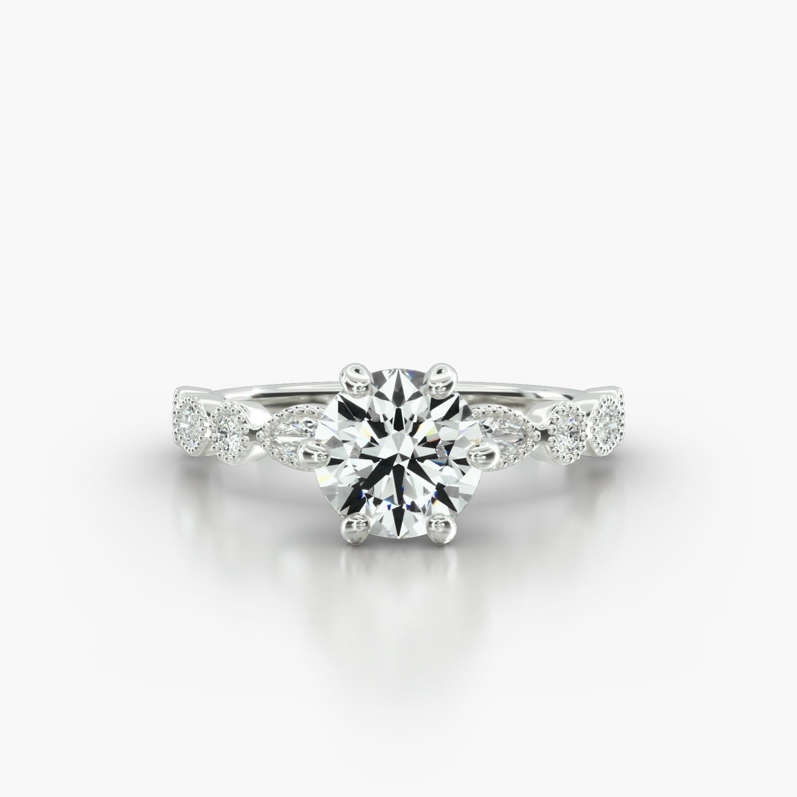 Round & Marquise Shape Diamond Engagement Ring Embellished With a Six Prong Signature Head