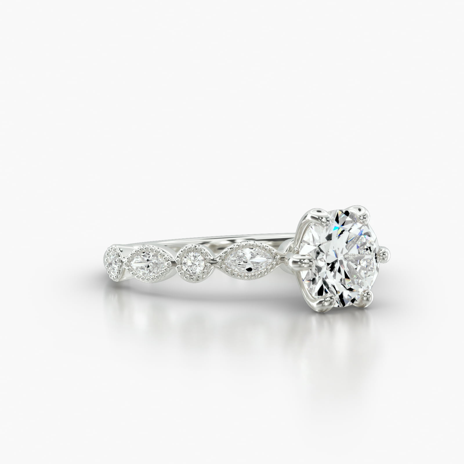 Round & Marquise Shape Diamond Engagement Ring Embellished With a Six Prong Signature Head