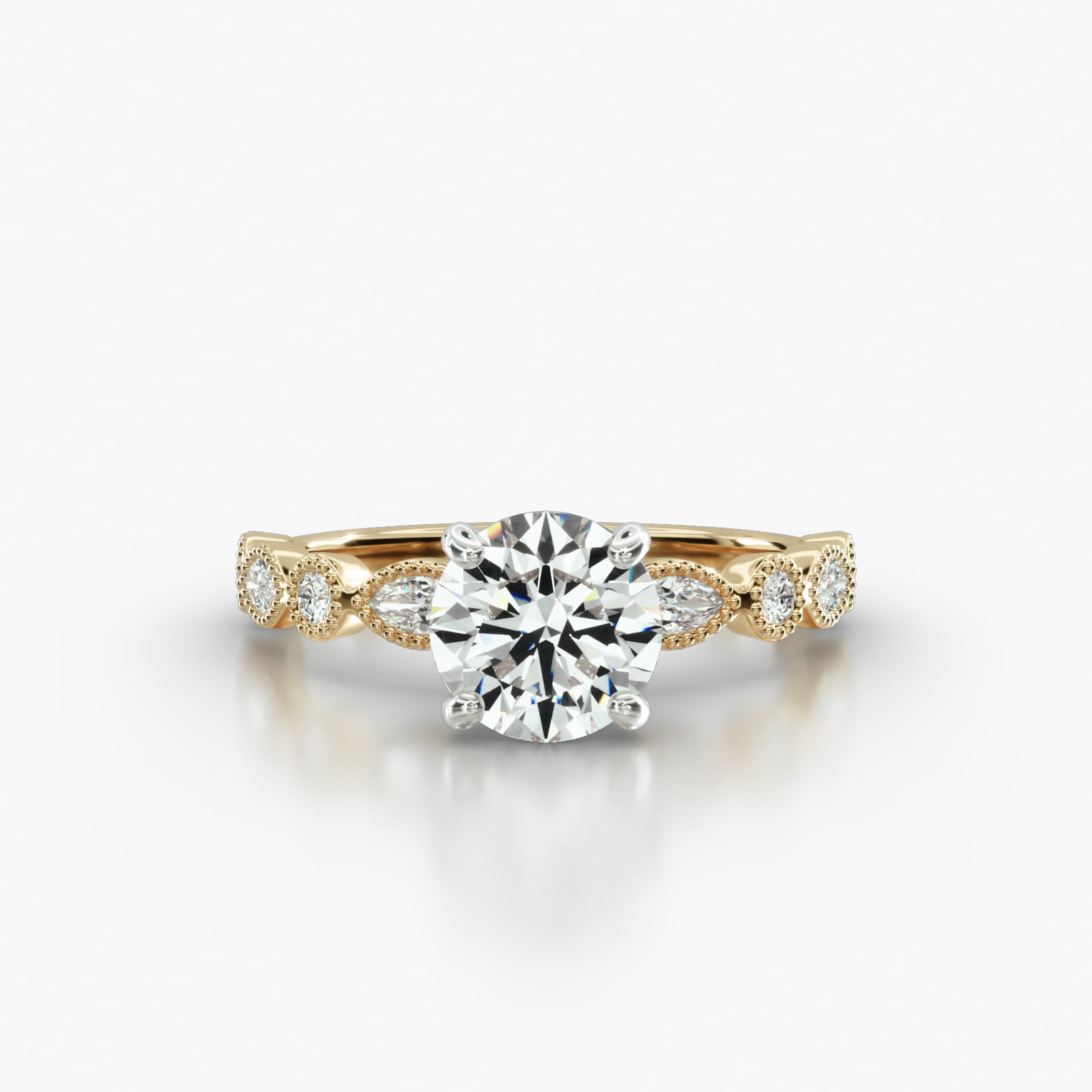 Round & Marquise Shape Diamond Engagement Ring Embellished With a Classic Basket Head