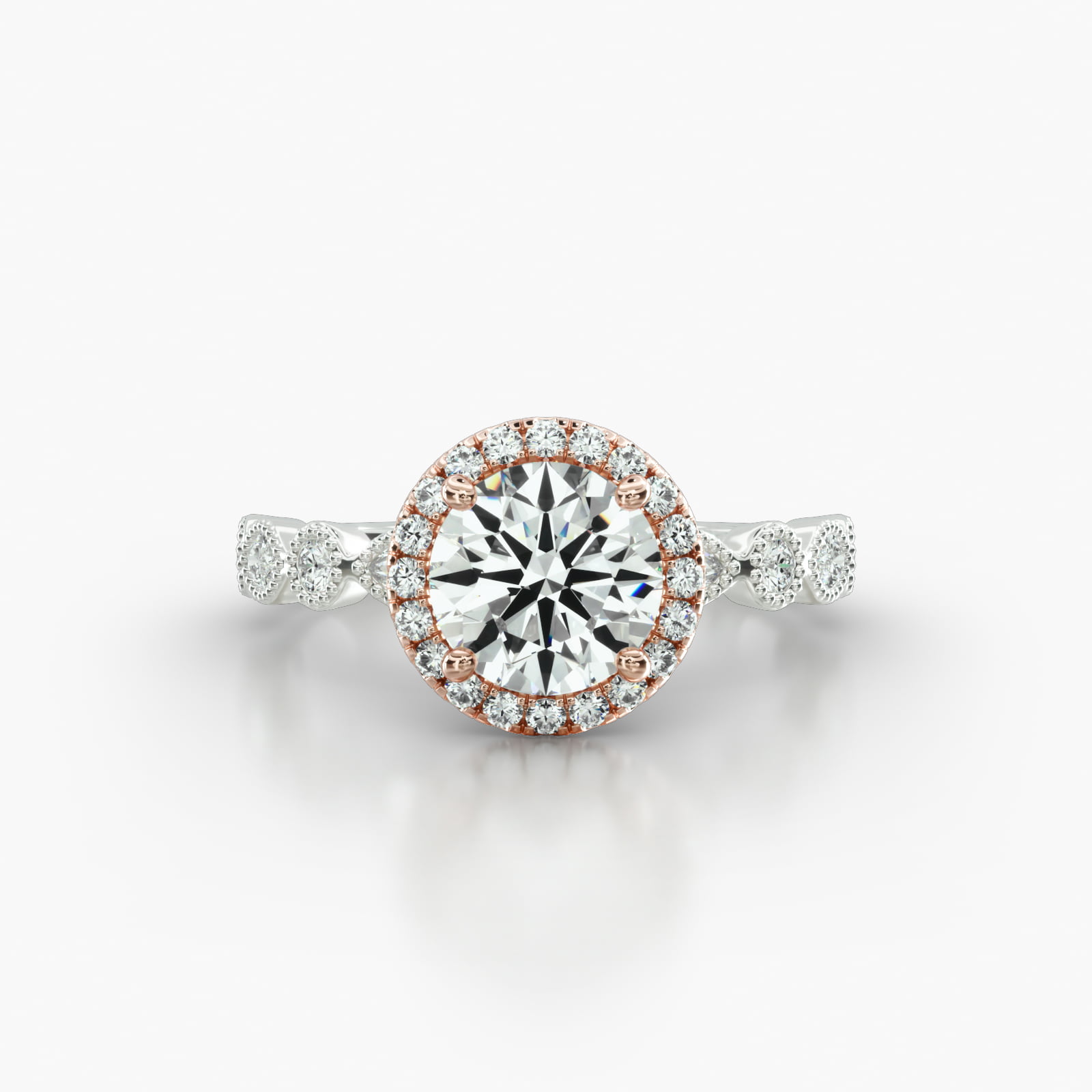 Round & Marquise Shape Diamond Engagement Ring Embellished With a Single Row Pavé Halo Head