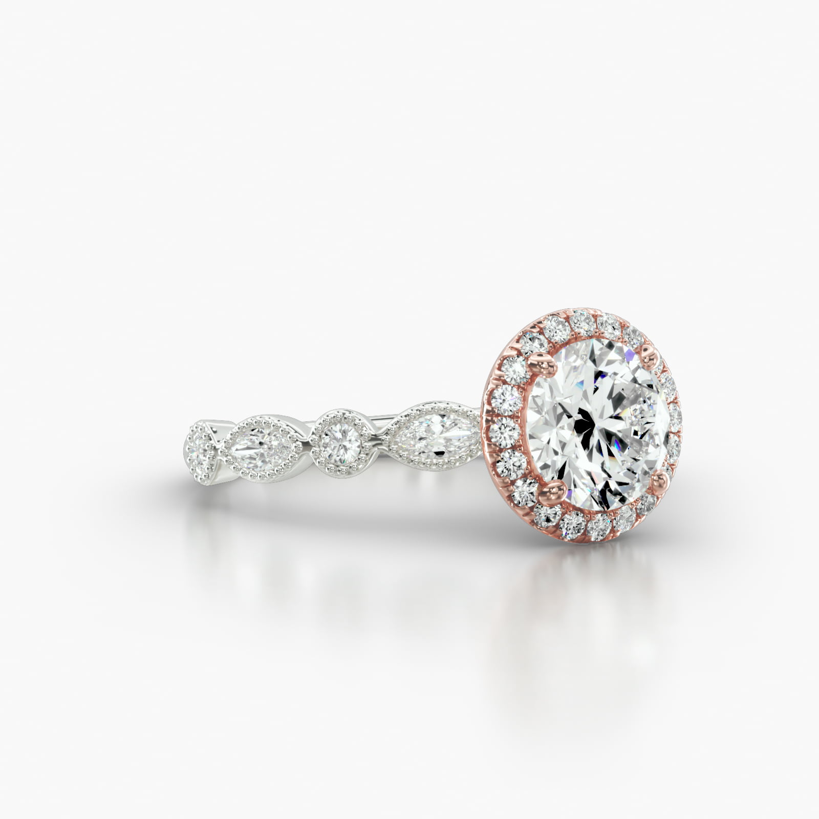 Round & Marquise Shape Diamond Engagement Ring Embellished With a Single Row Pavé Halo Head