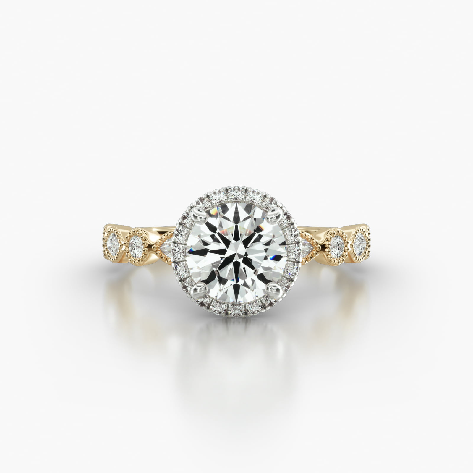 Round & Marquise Shape Diamond Engagement Ring Embellished With a French Pavé Halo Head