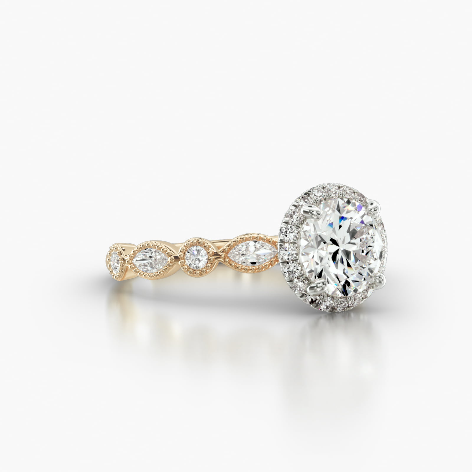 Round & Marquise Shape Diamond Engagement Ring Embellished With a French Pavé Halo Head