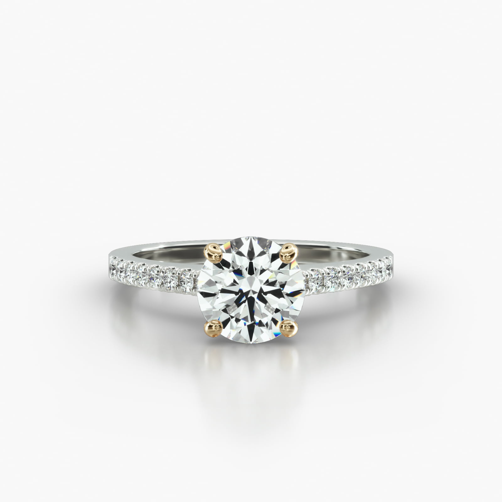 Cathedral Petite Pavé Engagement Ring Embellished With a Four Prong Signature Head With Diamond Bridge Accent