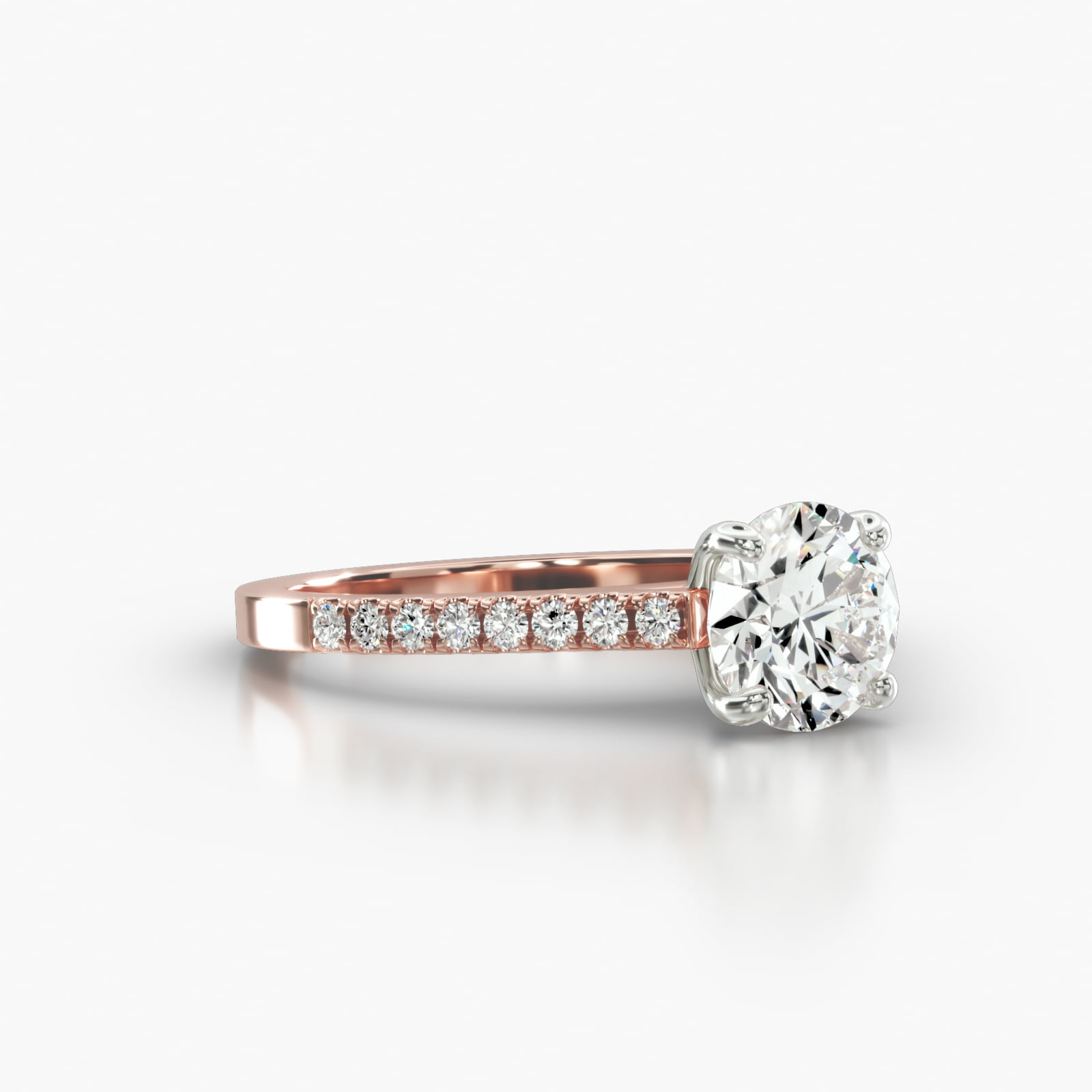 Cathedral Petite Pavé Engagement Ring Embellished With a Four Prong Signature Head With Sapphire Bridge Accent