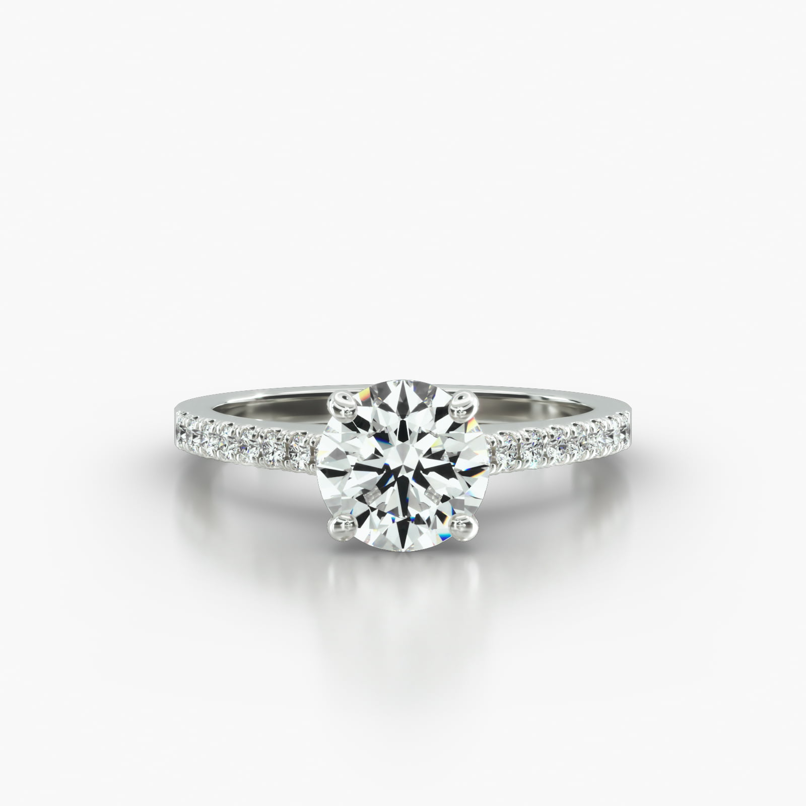 Cathedral Petite Pavé Engagement Ring Embellished With a Four Prong Signature Head With Sapphire Bridge Accent