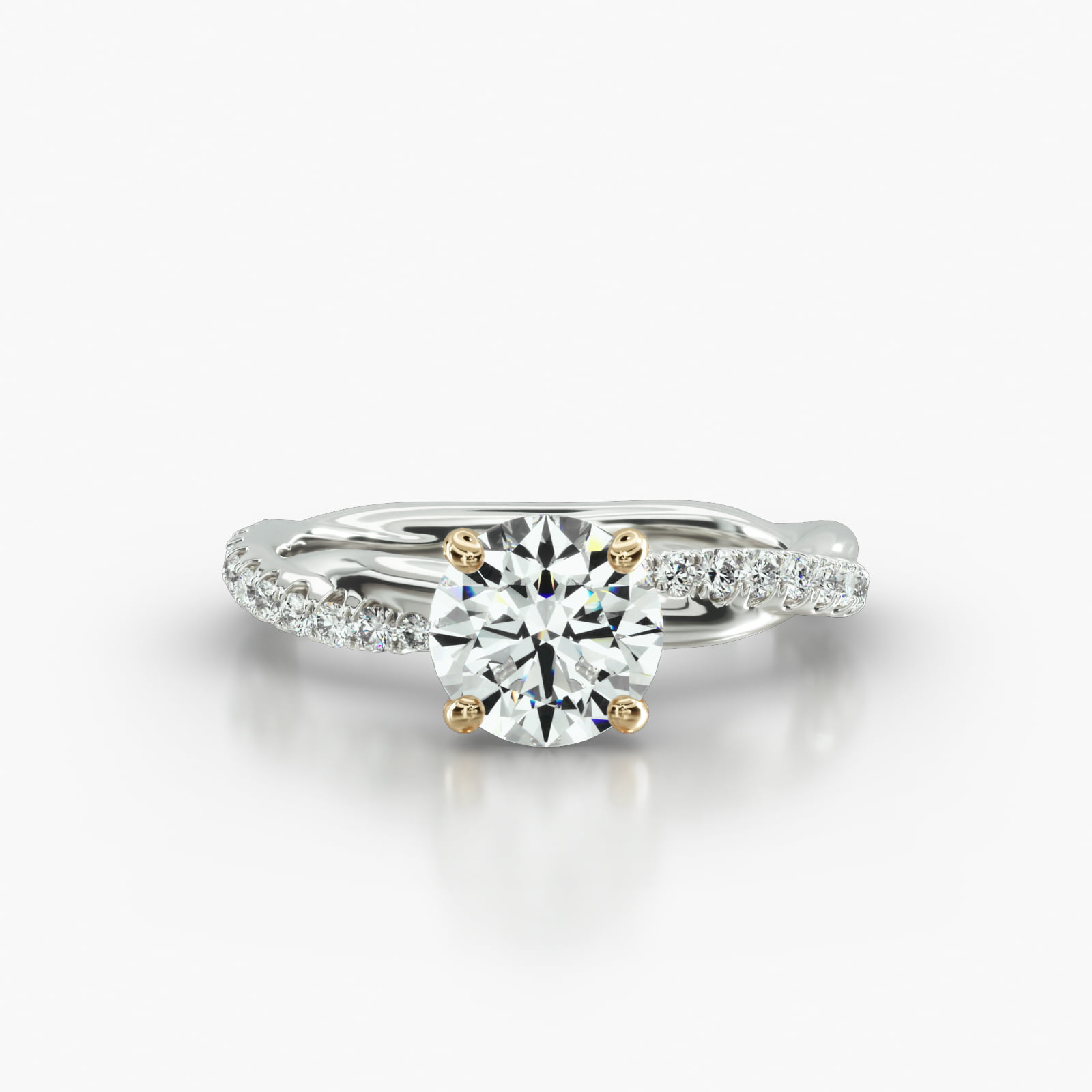 Rope Pavé Engagement Ring Embellished With a Four Prong Signature Head With Diamond Bridge Accent
