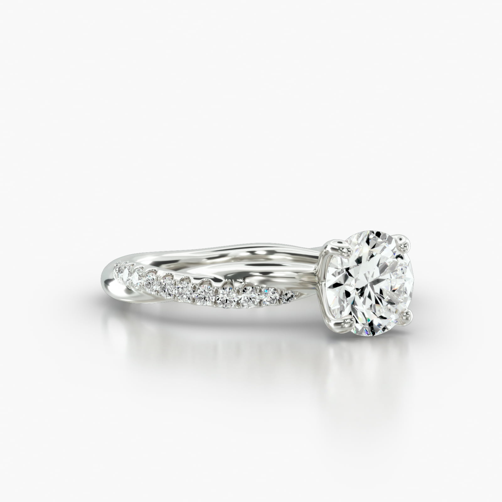 Rope Pavé Engagement Ring Embellished With a Four Prong Signature Head With Sapphire Bridge Accent