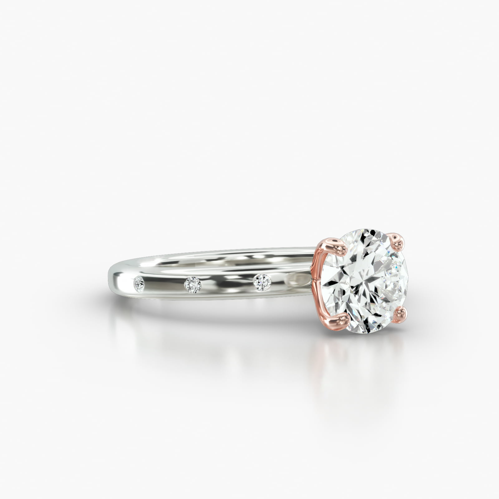 Sleek Accent Diamond Engagement Ring Embellished With a Four Prong Signature Head With Diamond Bridge Accent