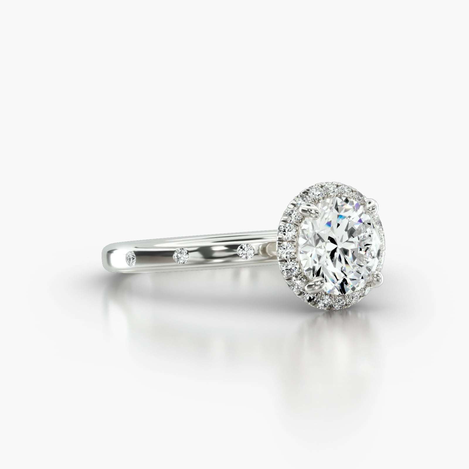 Sleek Accent Diamond Engagement Ring Embellished With a French Pavé Halo Head