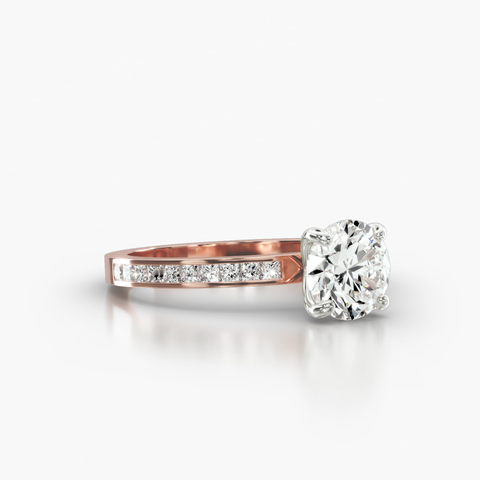 Channel Set Princess Cut Diamond Engagement Ring Embellished With a Four Prong Signature Head