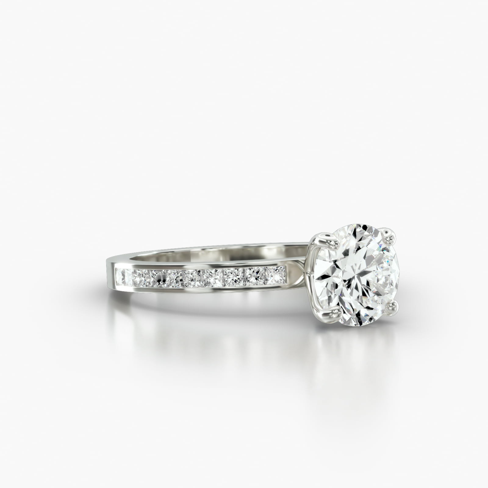 Channel Set Princess Cut Diamond Engagement Ring Embellished With a Four Prong Signature Head With Sapphire Bridge Accent