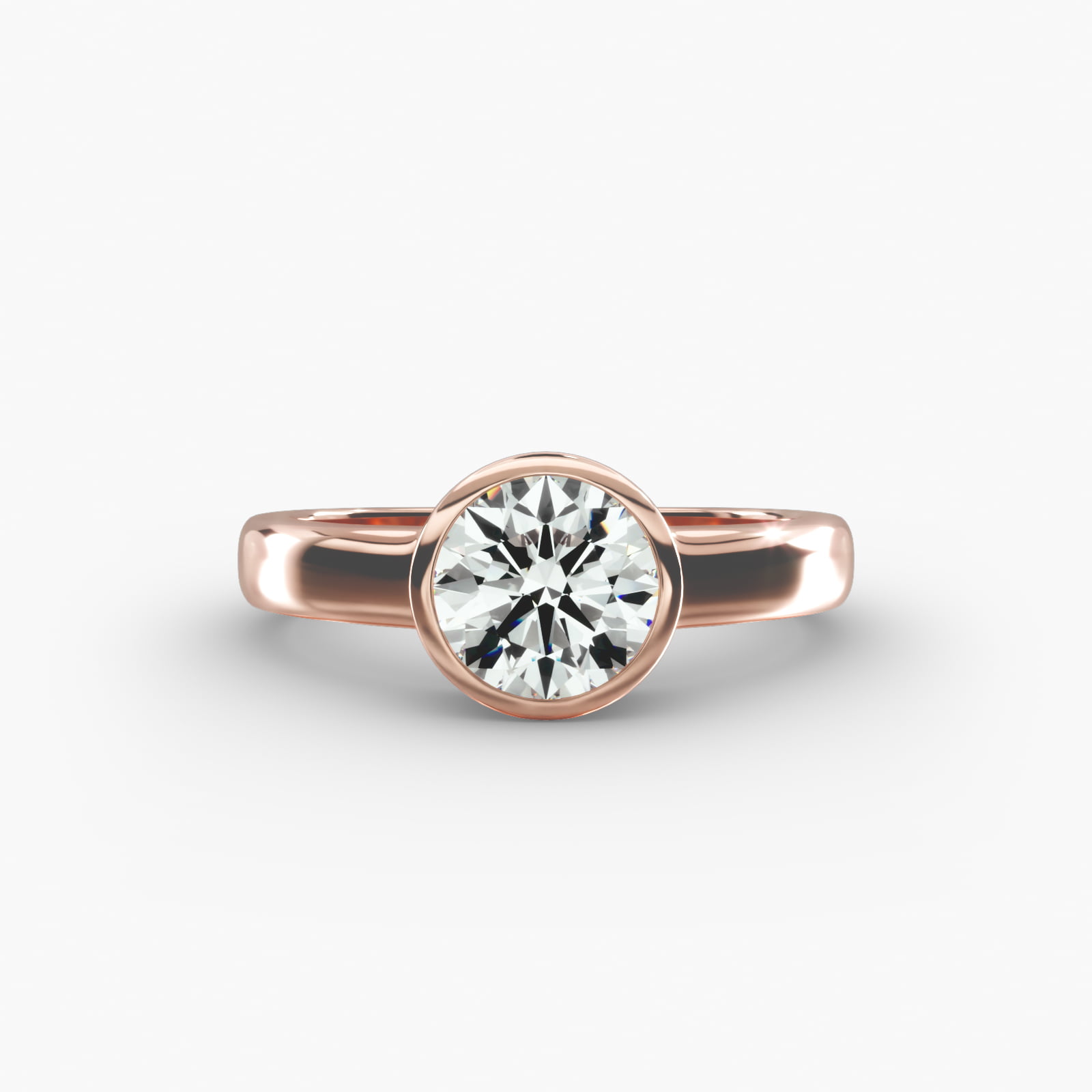 Bezel Set Round Solitaire Engagement Ring In 14K Rose Gold