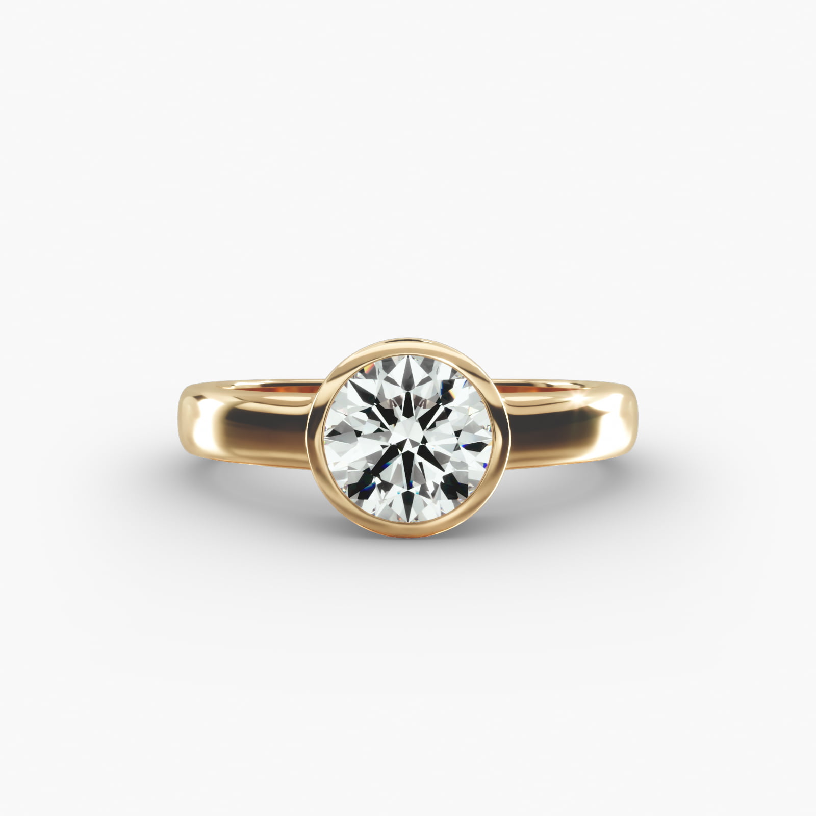 Bezel Set Round Solitaire Engagement Ring In 14K Yellow Gold