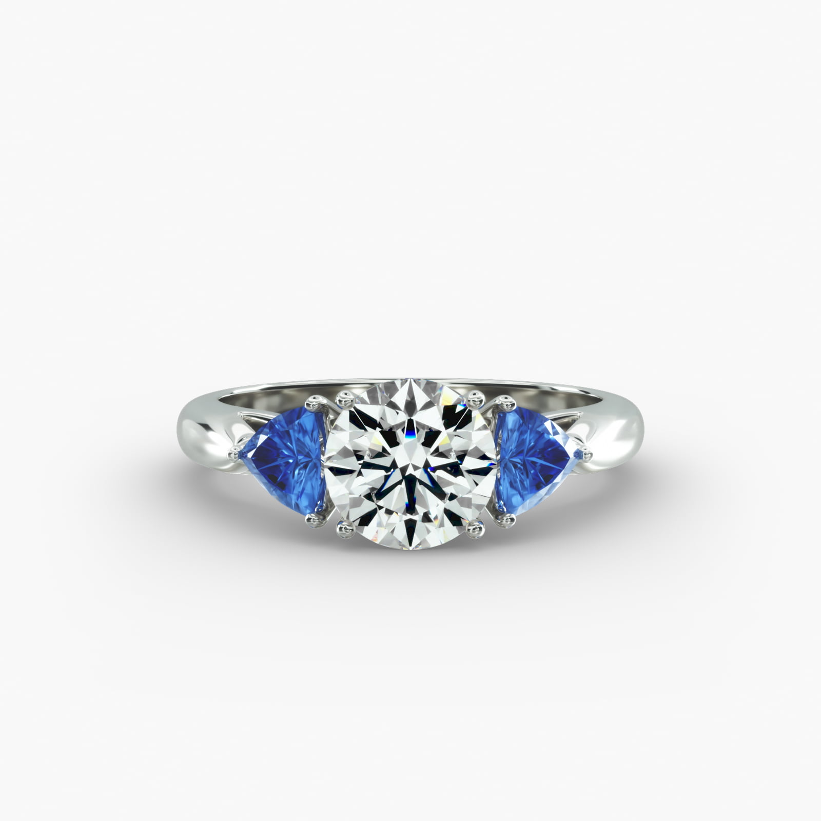 Trillion Cut Blue Sapphire Three Stone Engagement Ring In Platinum