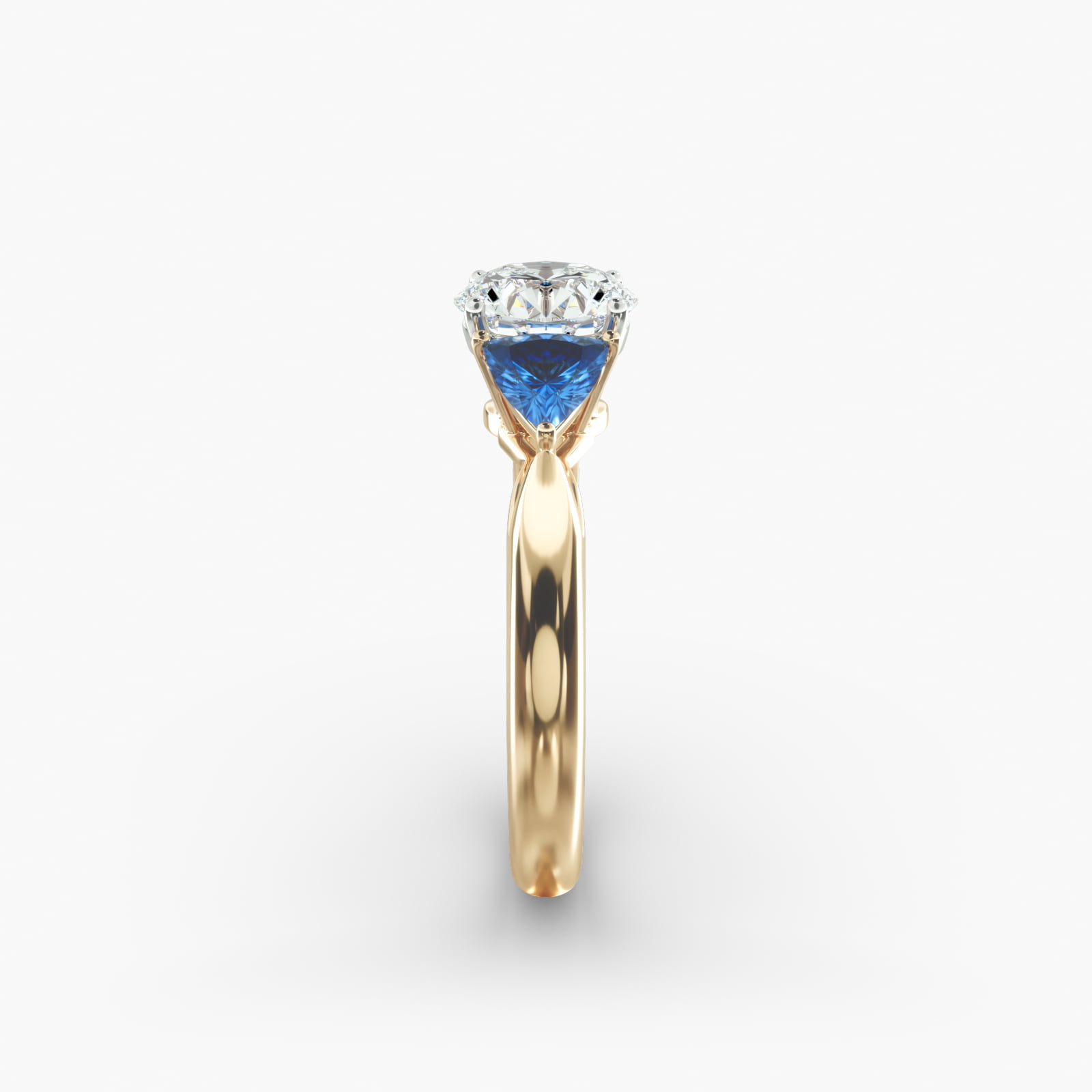 Trillion Cut Blue Sapphire Three Stone Engagement Ring In 18K Yellow Gold