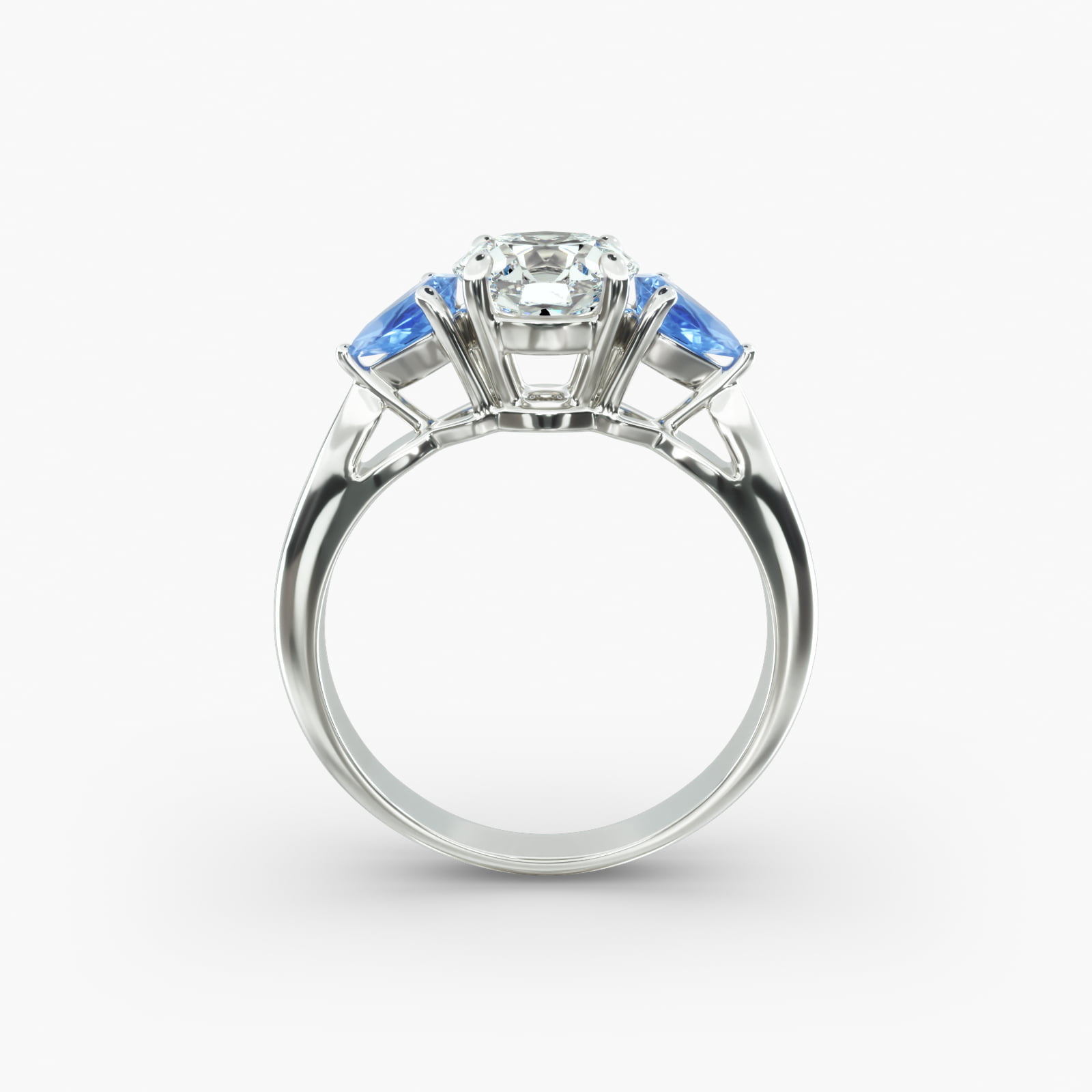 Pear Shaped Blue Sapphire Three Stone Engagement Ring In Platinum
