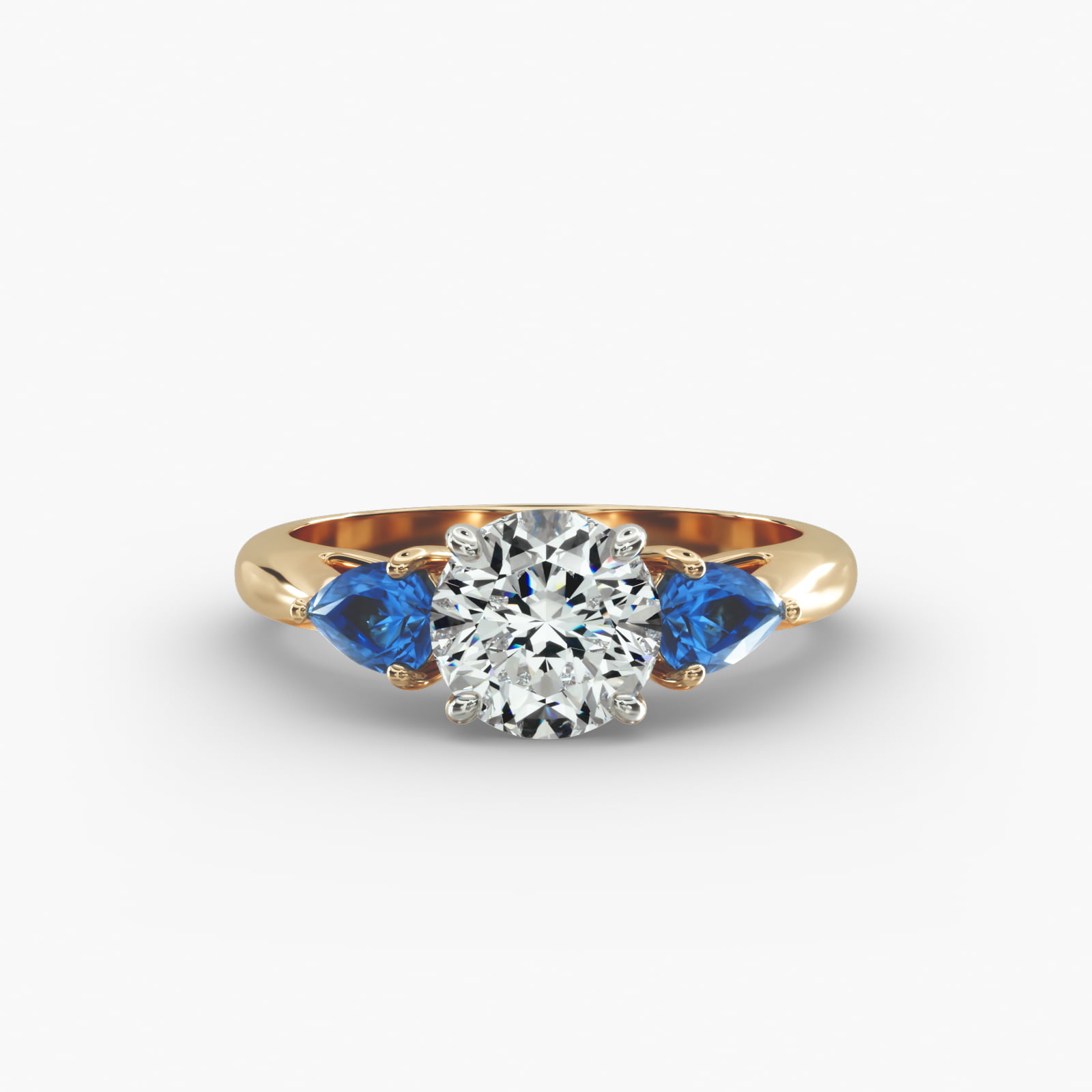 Pear Shaped Blue Sapphire Three Stone Engagement Ring In 18K Yellow Gold