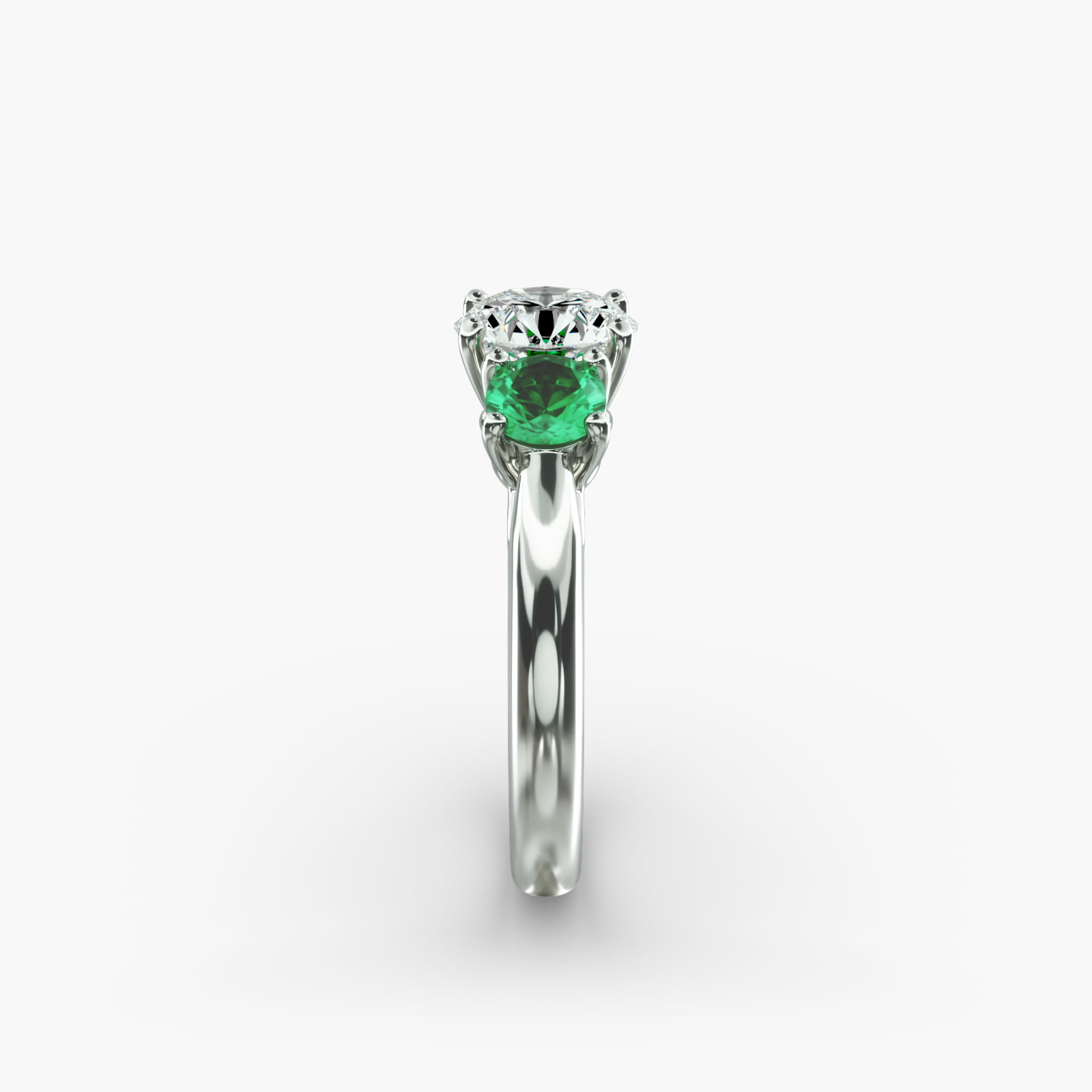 Round Emerald Three Stone Engagement Ring In 14K White Gold