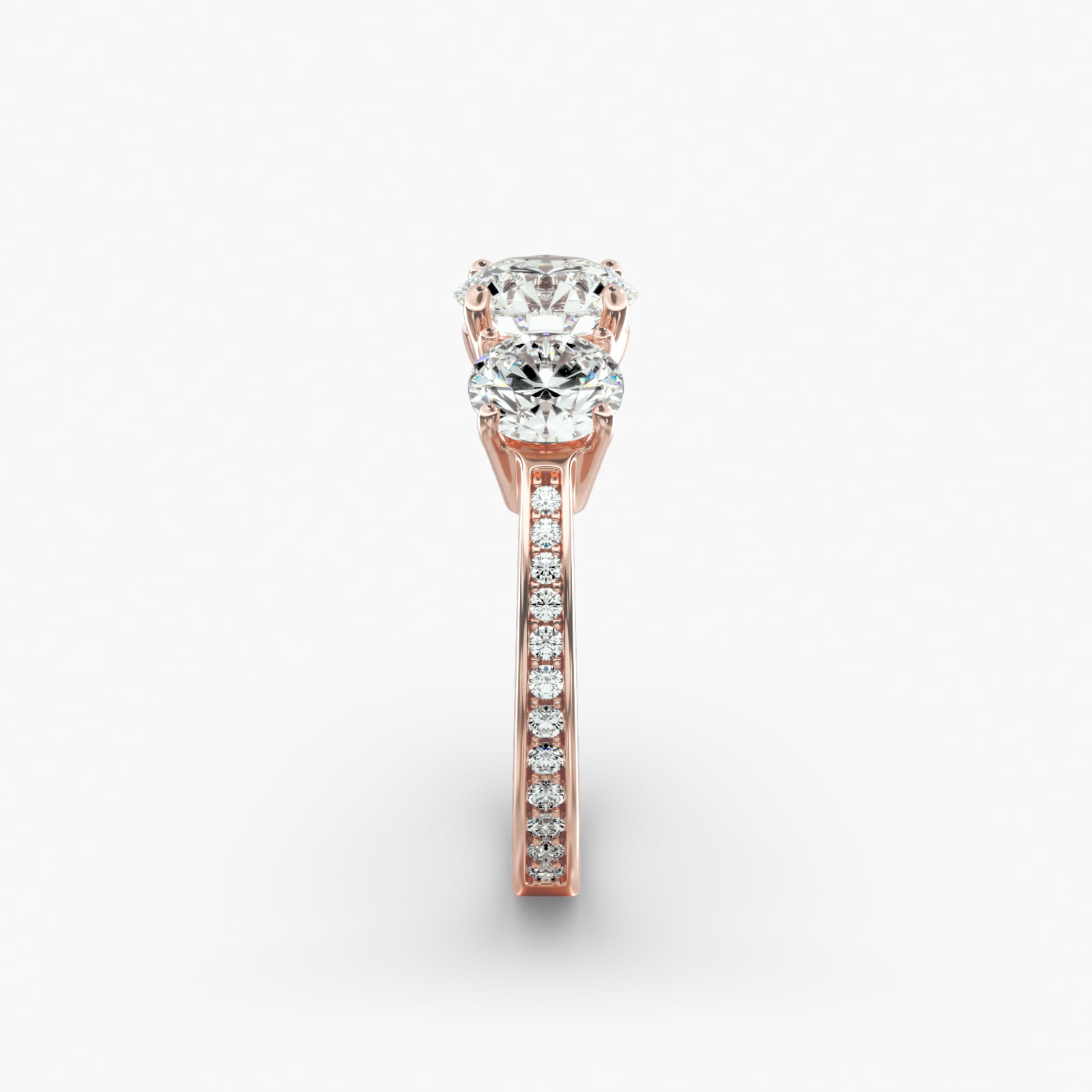 Round Diamond Three Stone Engagement Ring With Pavé Set Diamonds In 14K Rose Gold