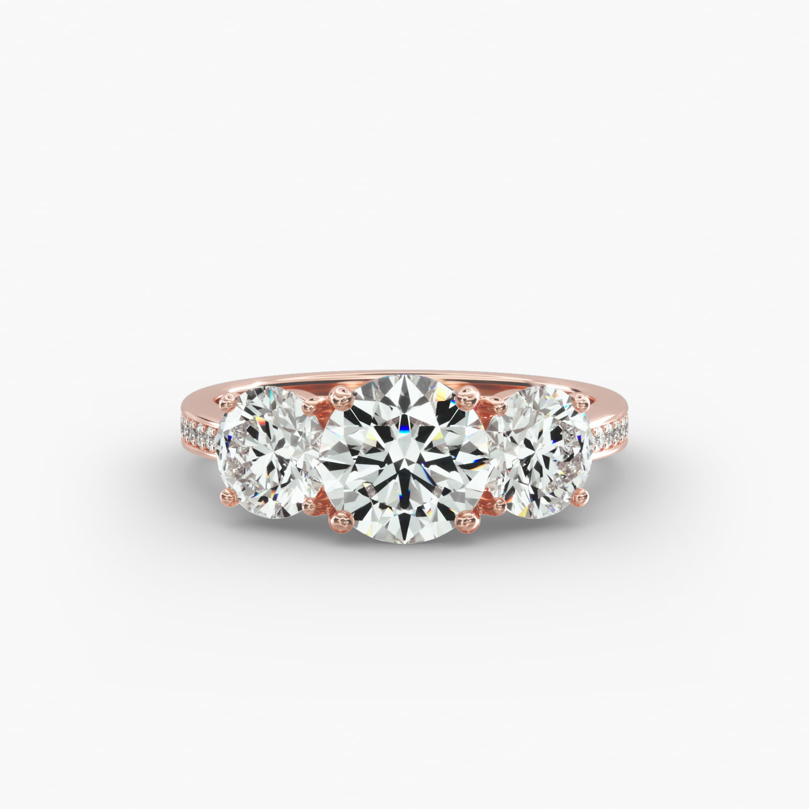 Round Diamond Three Stone Engagement Ring With Pavé Set Diamonds In 14K Rose Gold