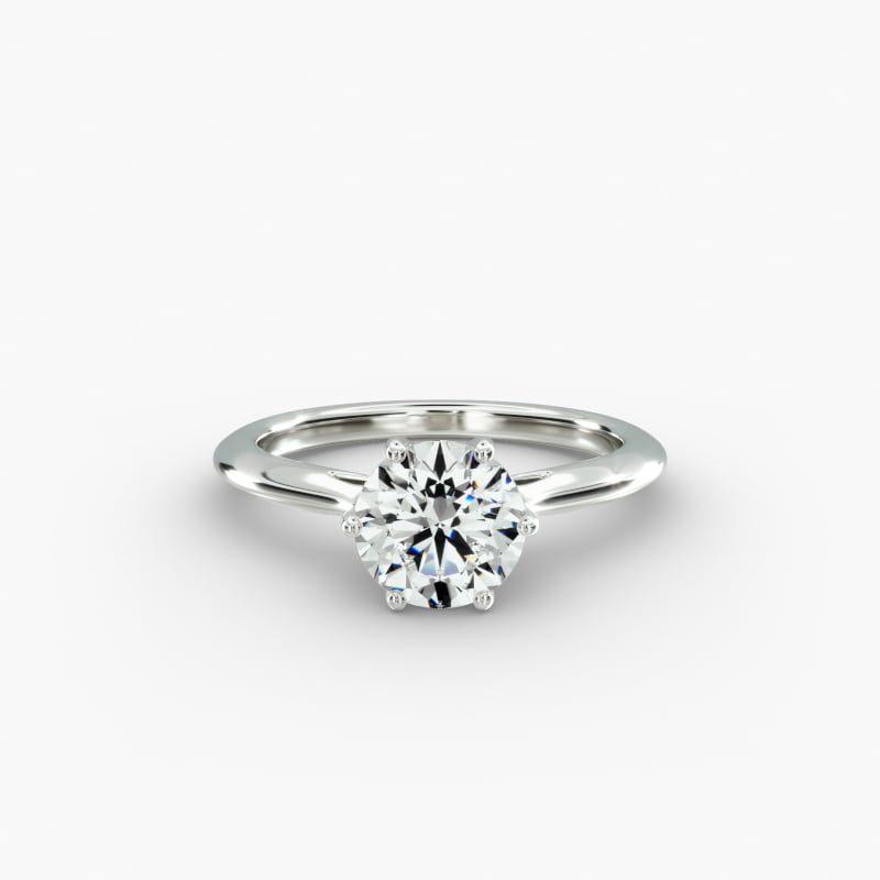 Knife Edge Solitaire Engagement Ring With Intricate Basket In Platinum