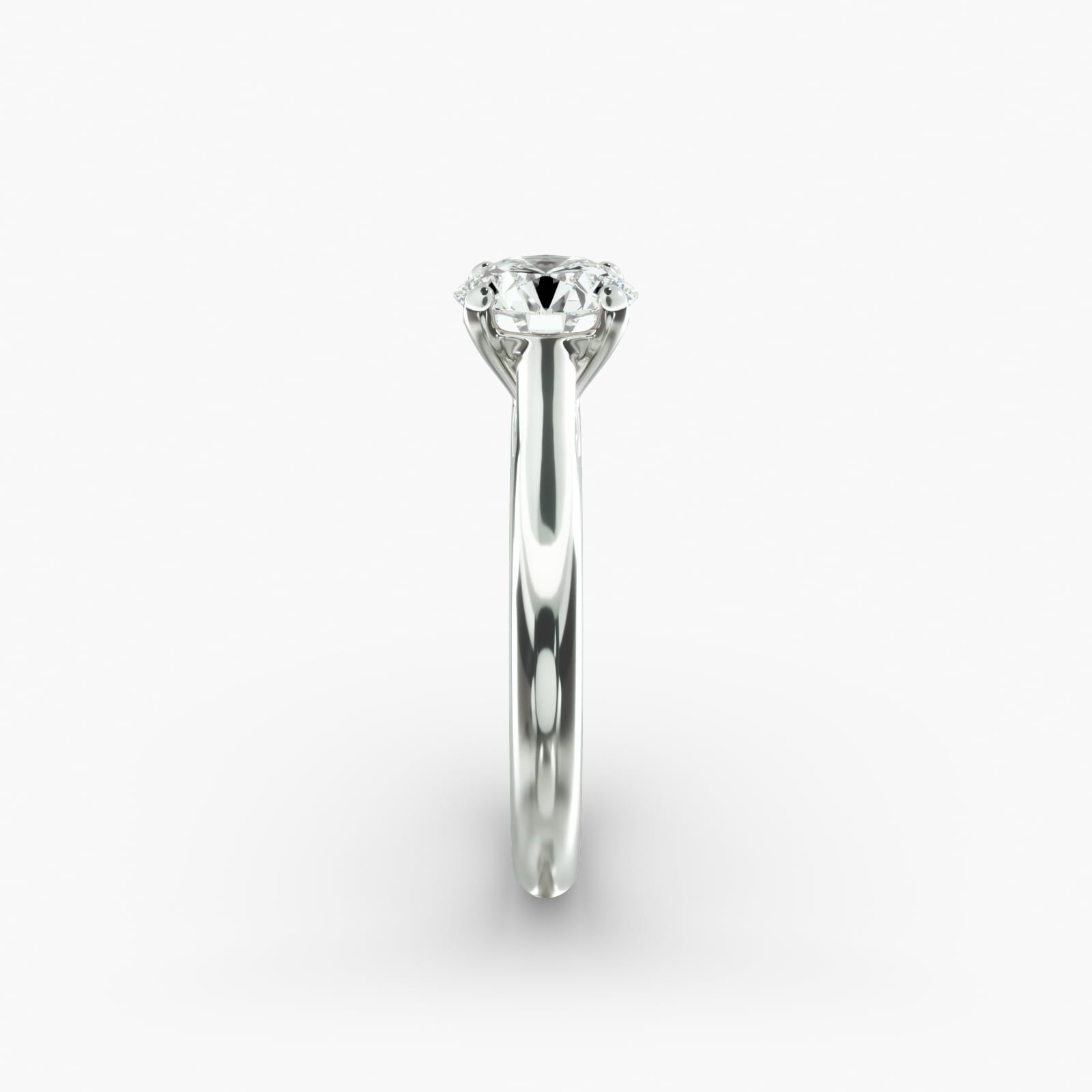 Sleek Solitaire Engagement Ring In 18K White Gold