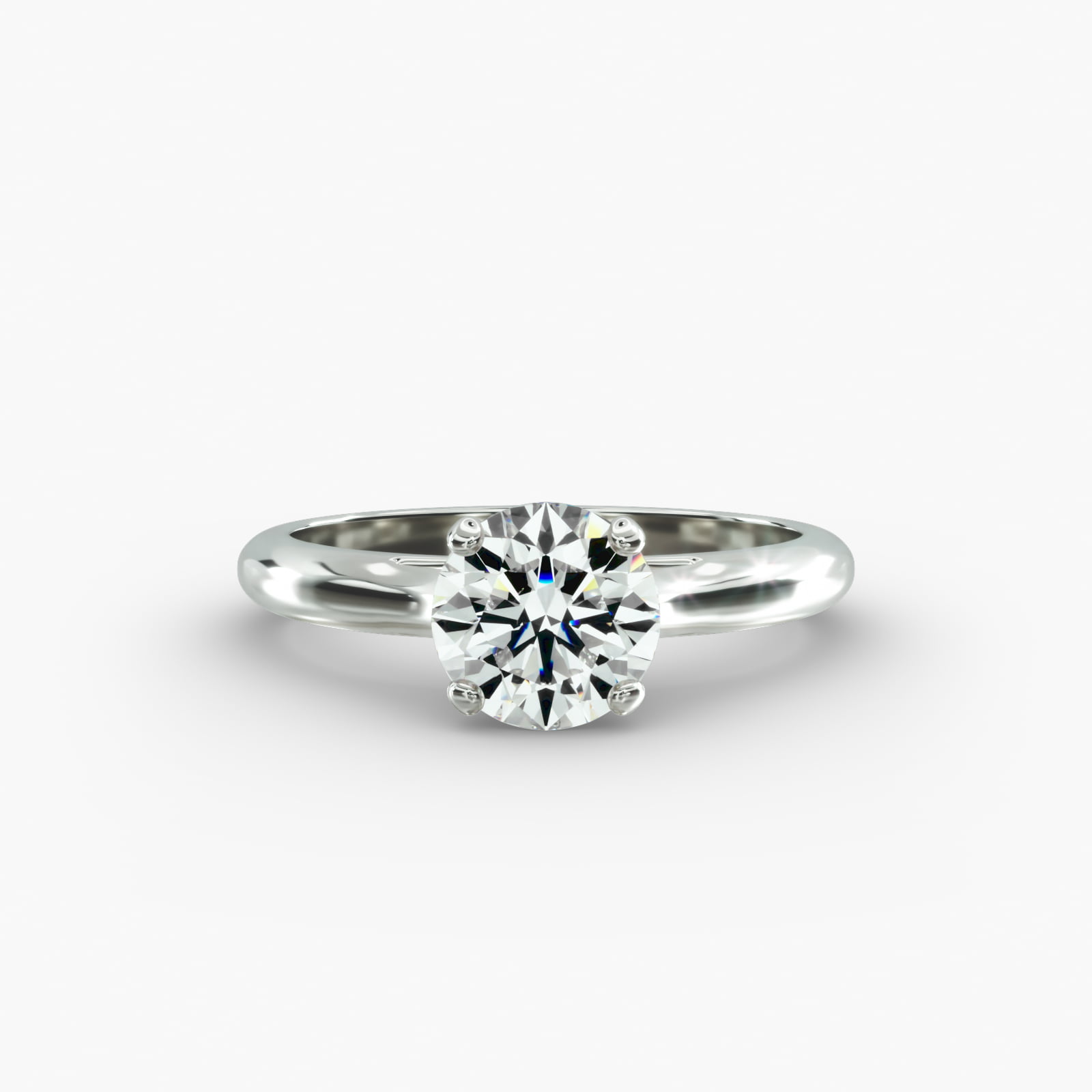 Sleek Solitaire Engagement Ring In 18K White Gold