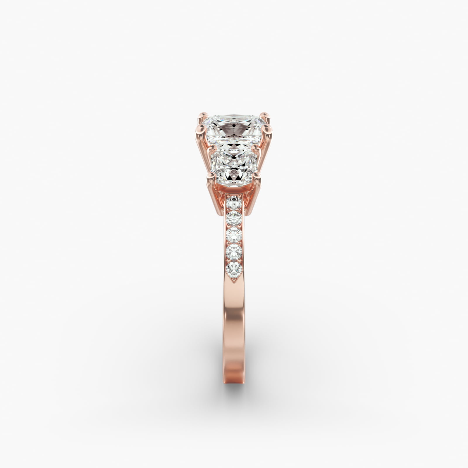 Princess Cut Diamond Three Stone Engagement Ring With Pavé Set Diamonds In 14K Rose Gold