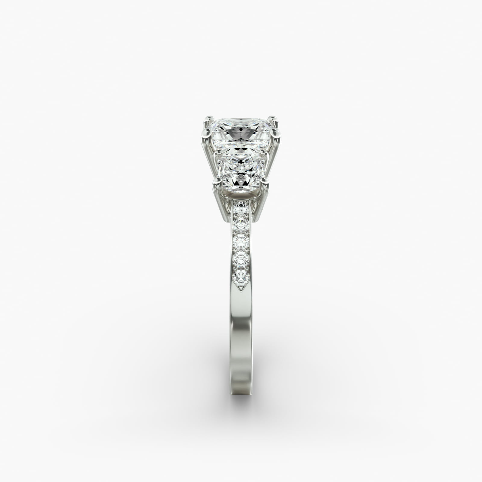Princess Cut Diamond Three Stone Engagement Ring With Pavé Set Diamonds In 18K White Gold