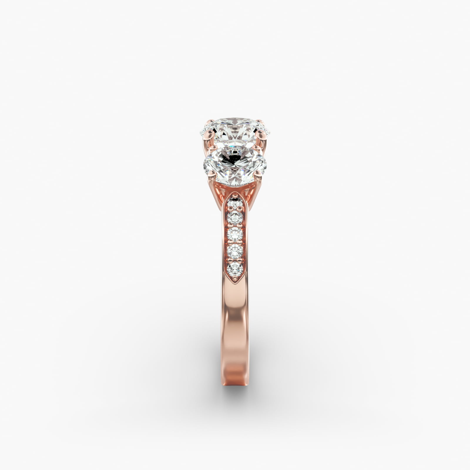 Round Diamond Three Stone Engagement Ring With Pavé Set Diamonds In 14K Rose Gold
