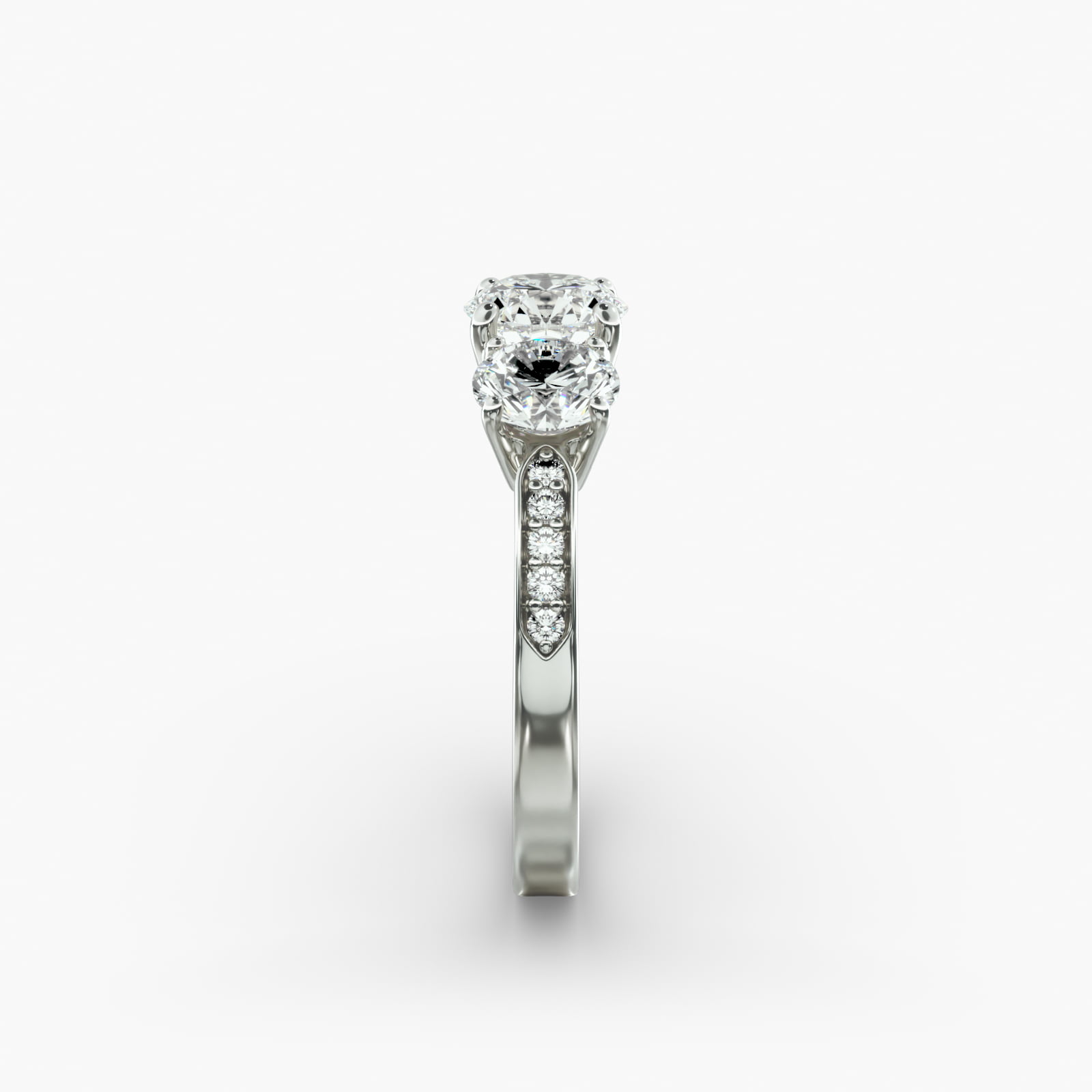 Round Diamond Three Stone Engagement Ring With Pavé Set Diamonds In 14K White Gold