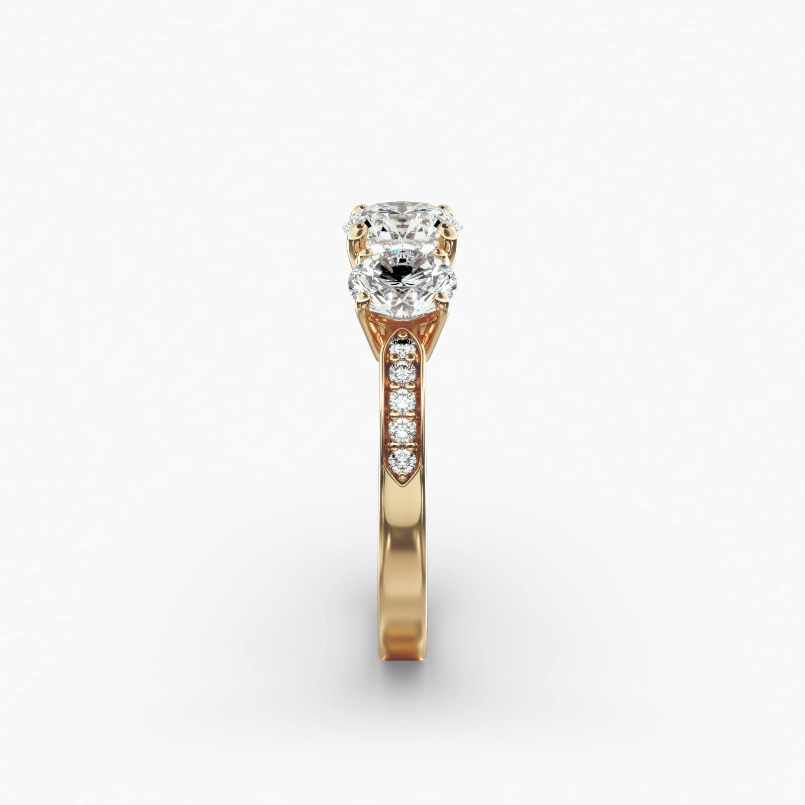 Round Diamond Three Stone Engagement Ring With Pavé Set Diamonds In 14K Yellow Gold
