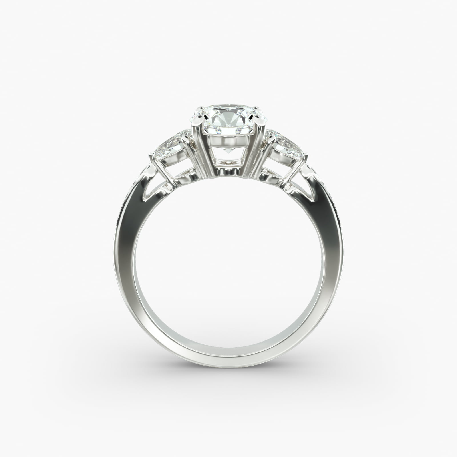 Pear Shaped Diamond Three Stone Engagement Ring With Pavé Set Diamonds In 14K White Gold