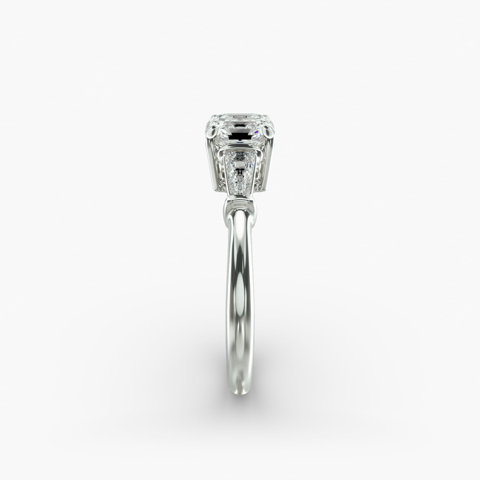 Tapered Baguette Diamond Three Stone Engagement Ring In Platinum