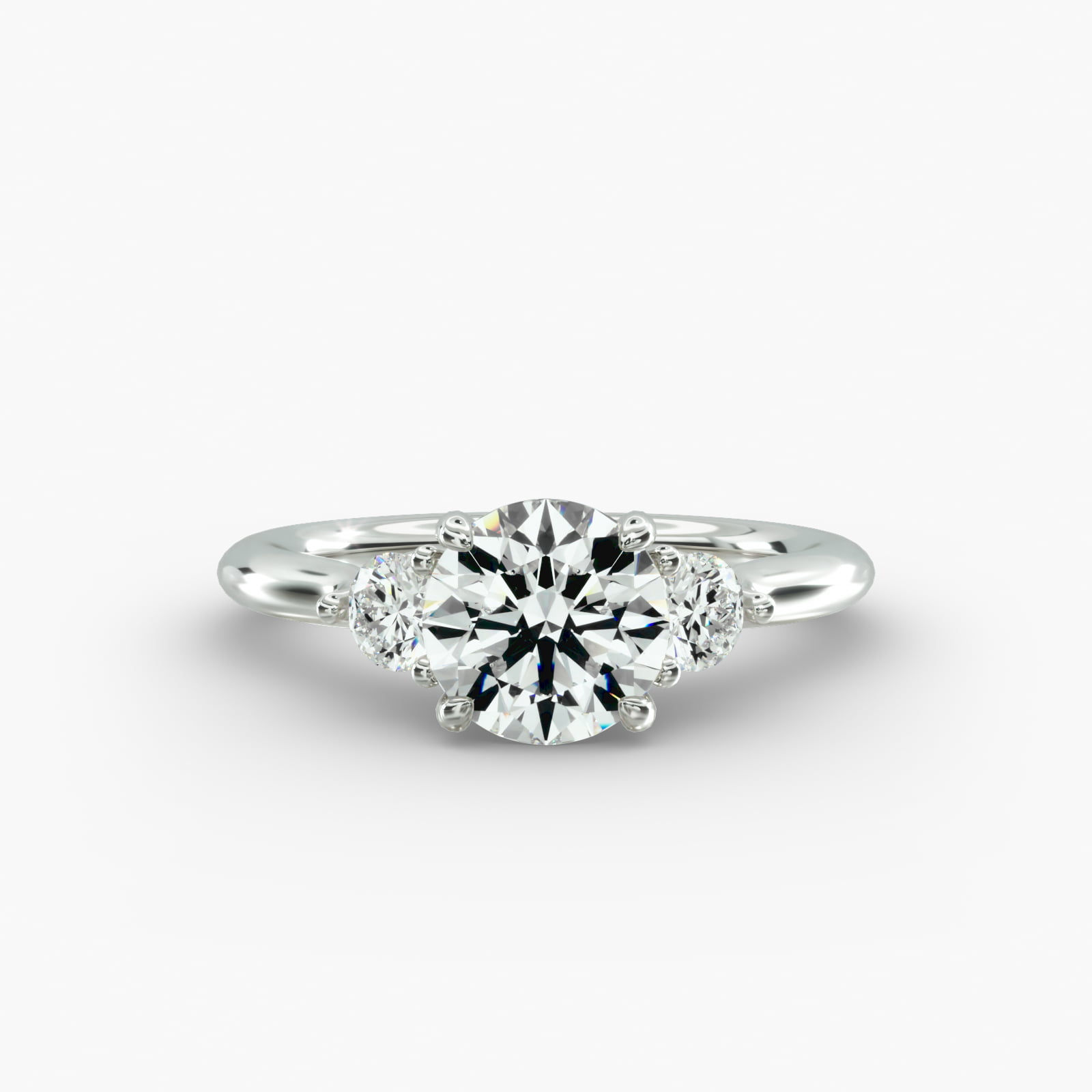 Classic Round Diamond Three Stone Engagement Ring In Platinum