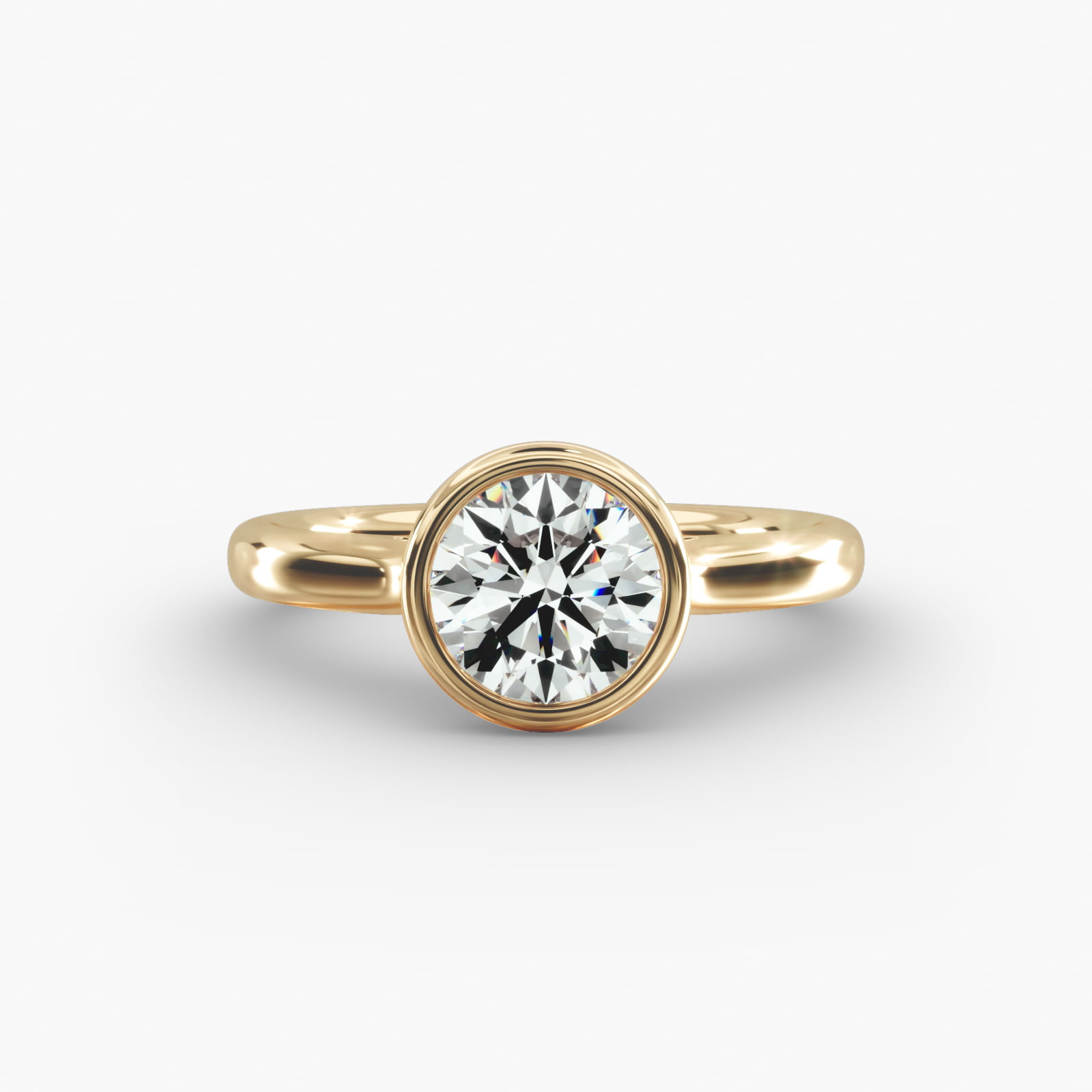 Bezel Set Solitaire Engagement Ring In 14K Yellow Gold