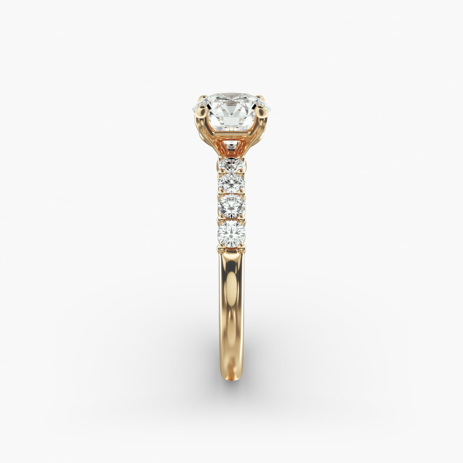 Prong Set Side Stone Diamond Engagement Ring In 14K Yellow Gold
