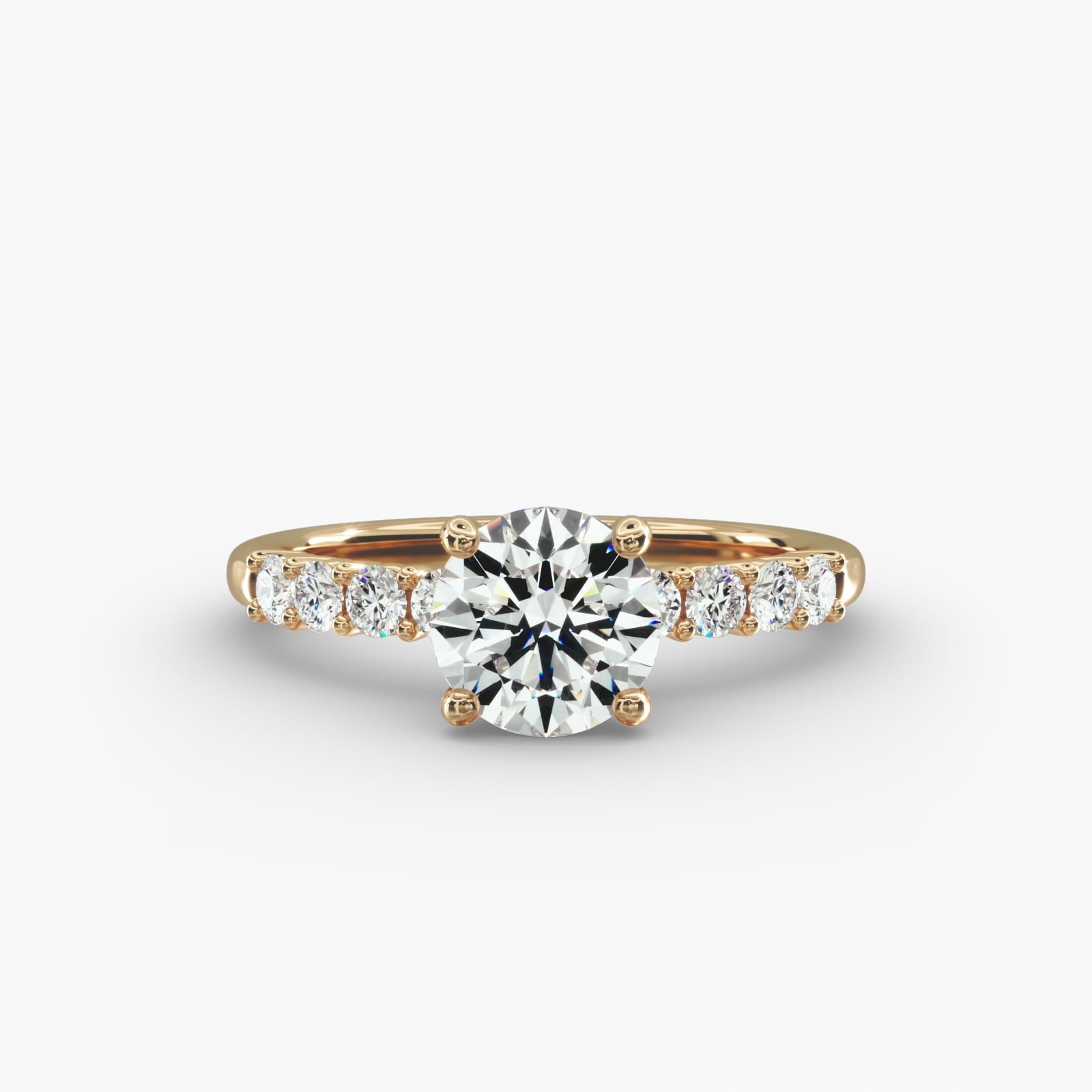 Prong Set Side Stone Diamond Engagement Ring In 14K Yellow Gold