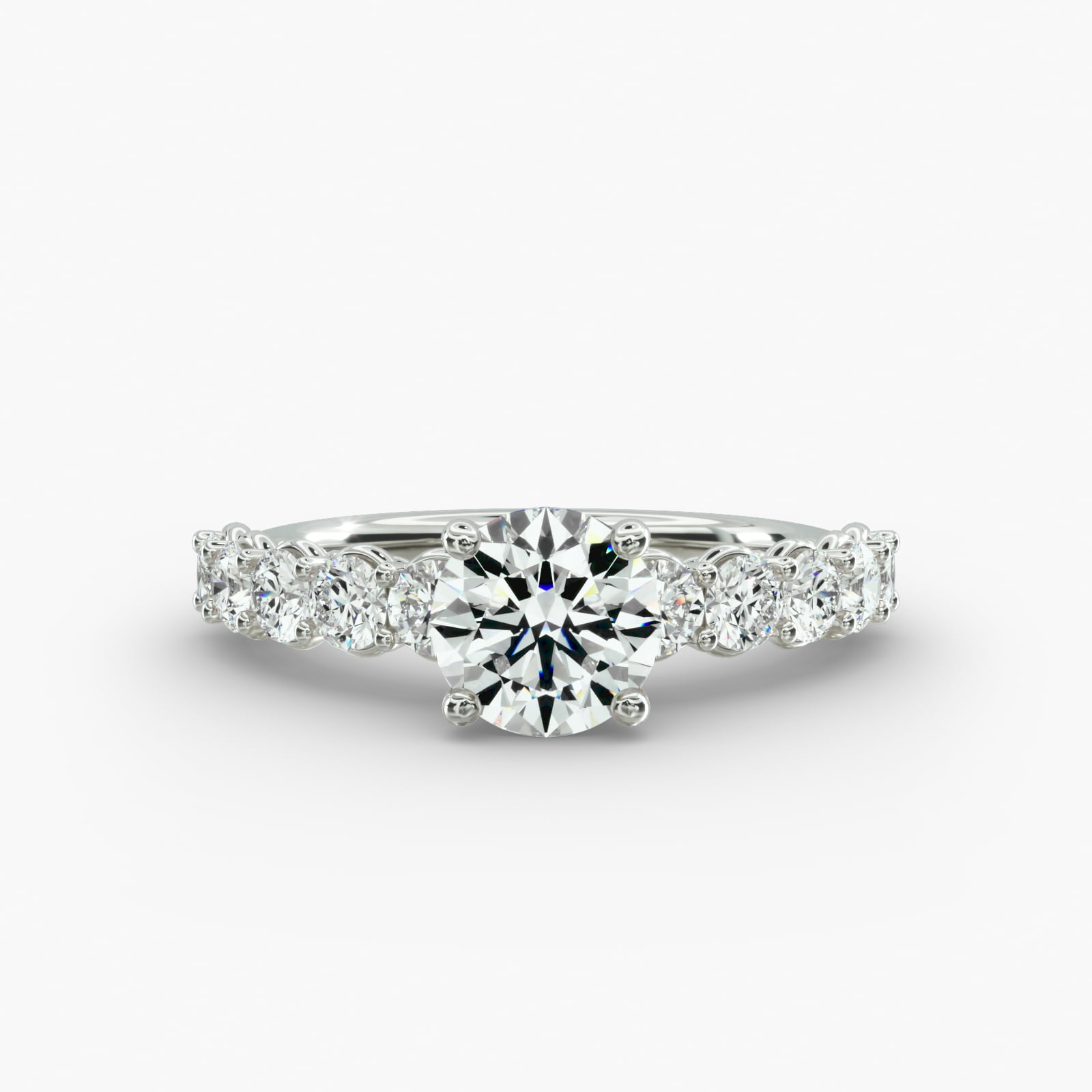Prong Set Side Stone Diamond Engagement Ring In 14K White Gold
