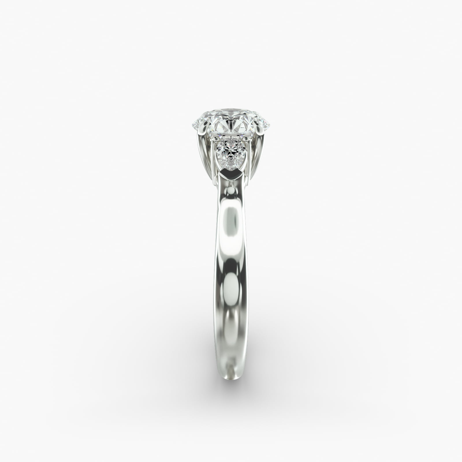 Pear Shaped Diamond Three Stone Engagement Ring In 18K White Gold