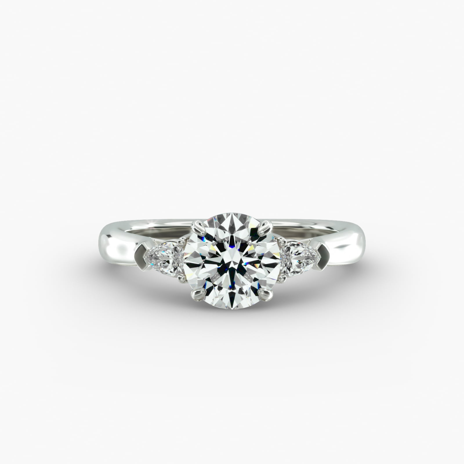 Pear Shaped Diamond Three Stone Engagement Ring In 18K White Gold