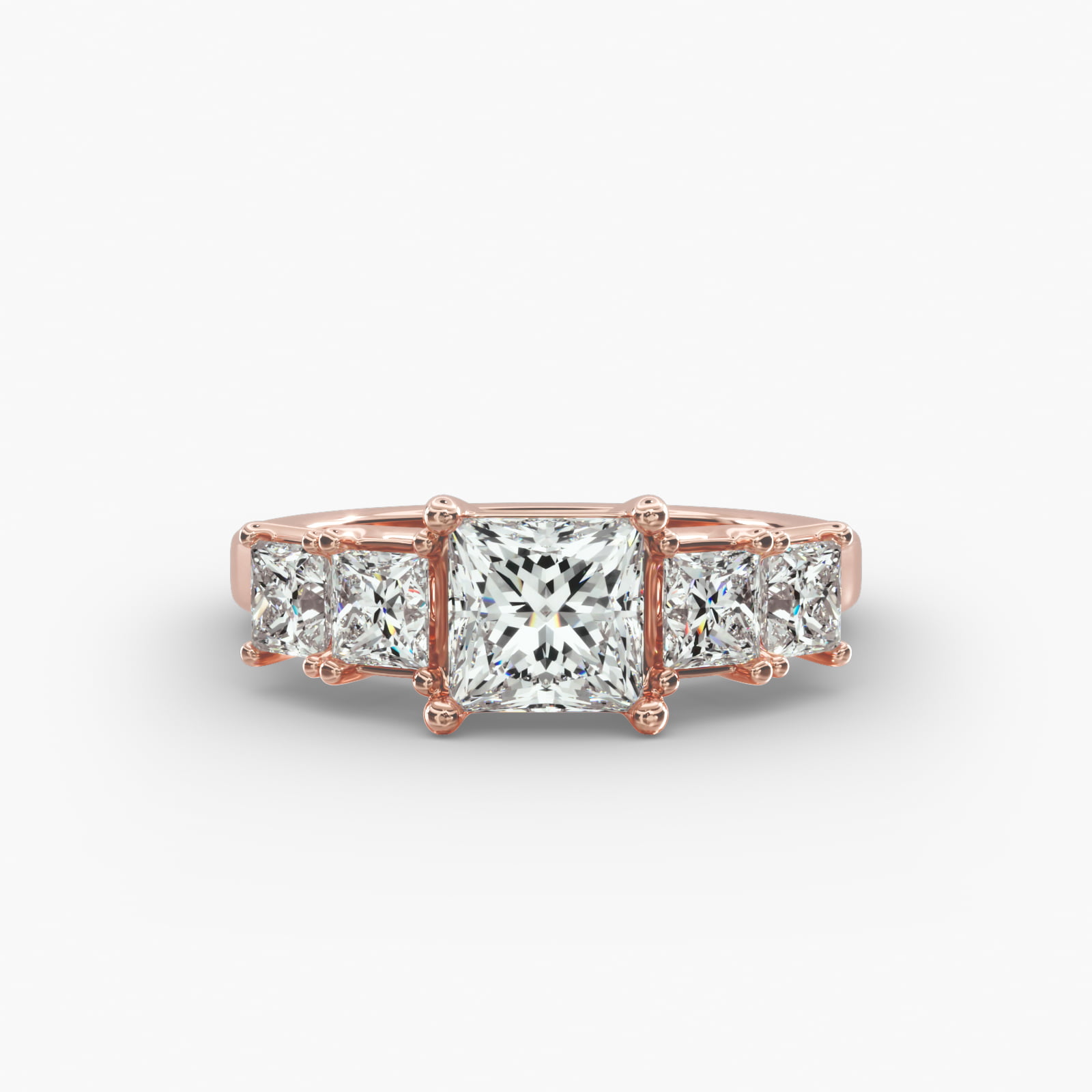 Four Princess Cut Side Stone Diamond Engagement Ring In 14K Rose Gold