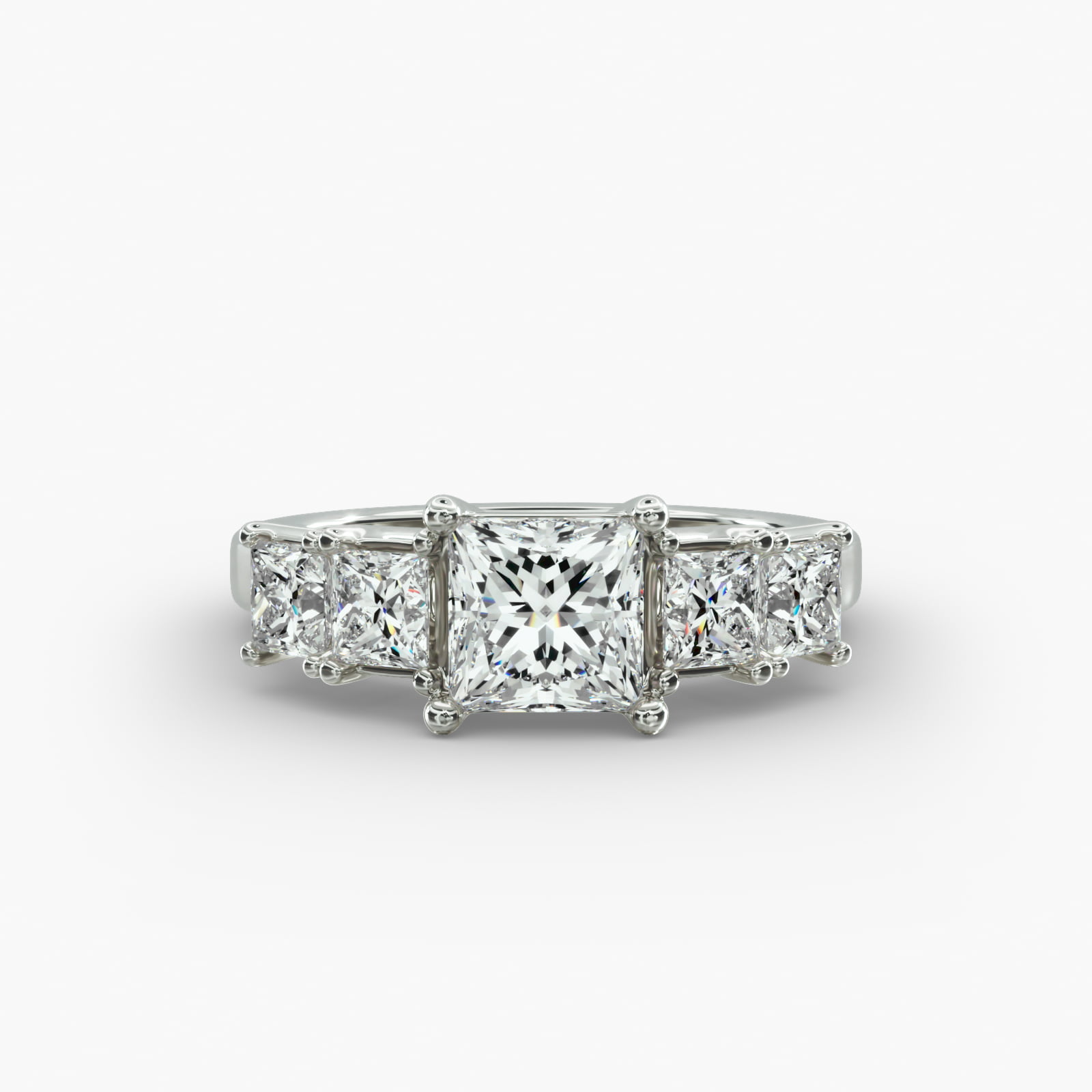 Four Princess Cut Side Stone Diamond Engagement Ring In 14K White Gold