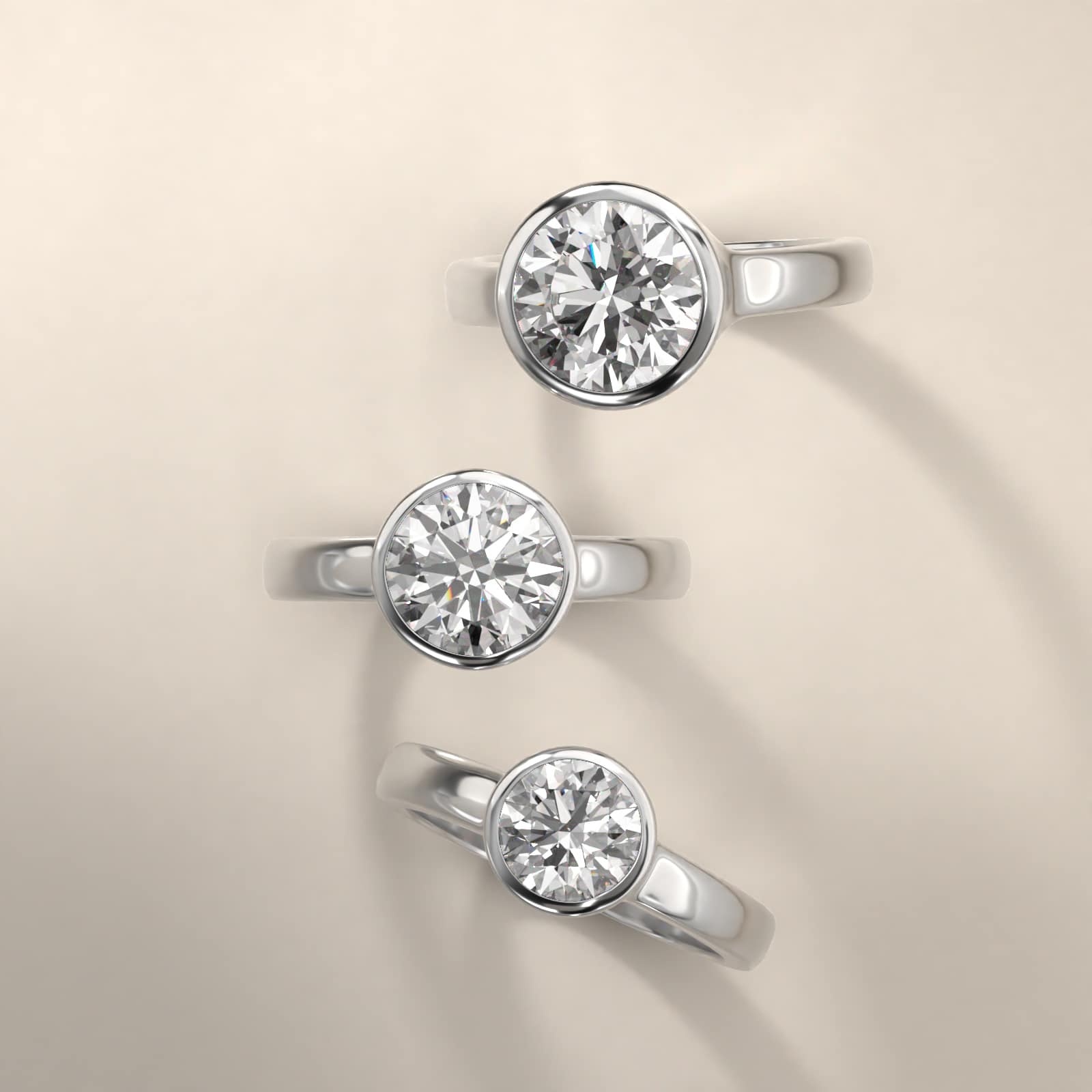 Bezel Set Round Solitaire Engagement Ring In Platinum