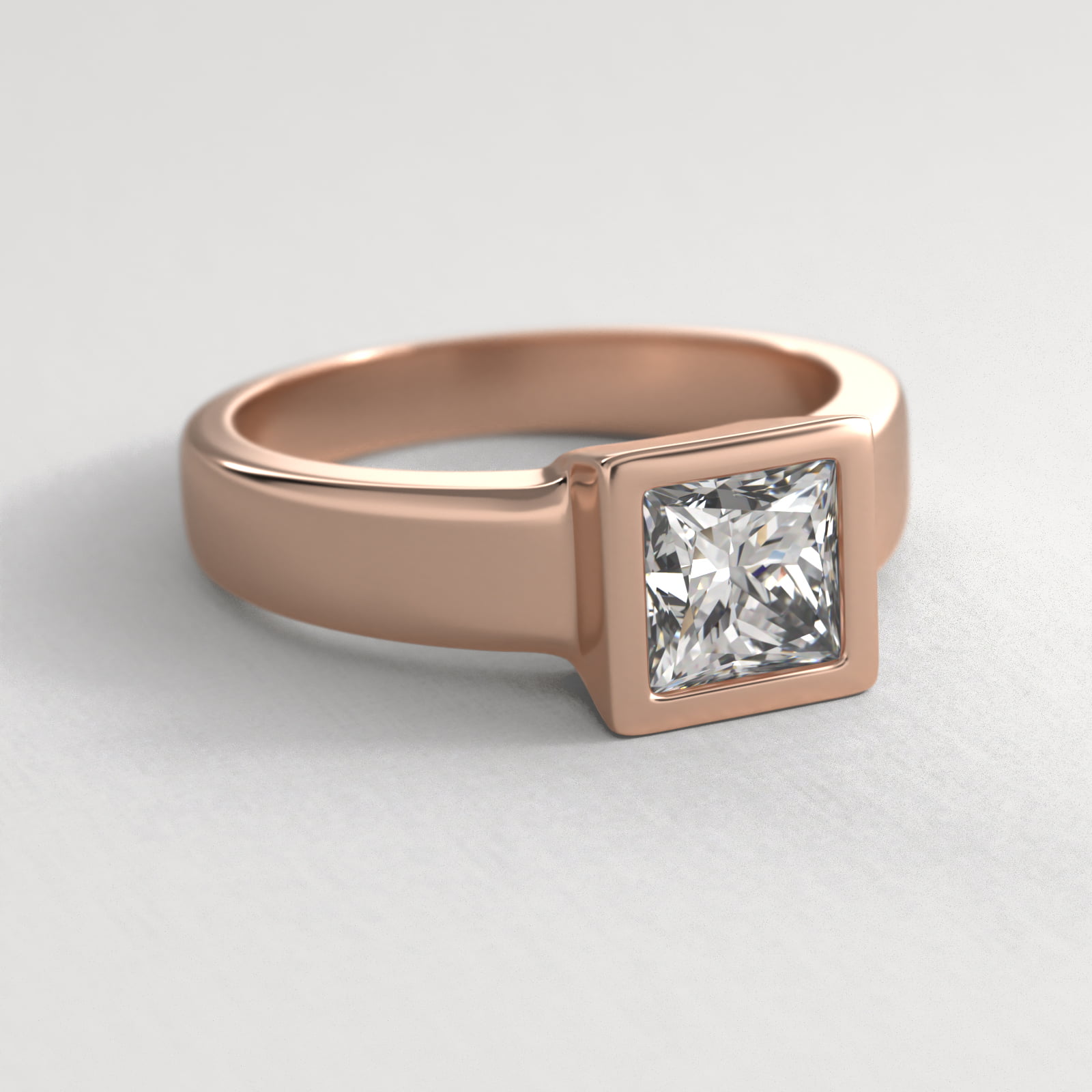 Bezel Set Princess Cut Solitaire Engagement Ring In 14K Rose Gold