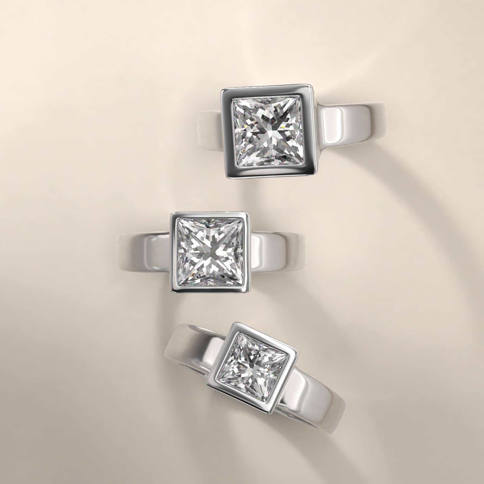 Bezel Set Princess Cut Solitaire Engagement Ring In 14K White Gold