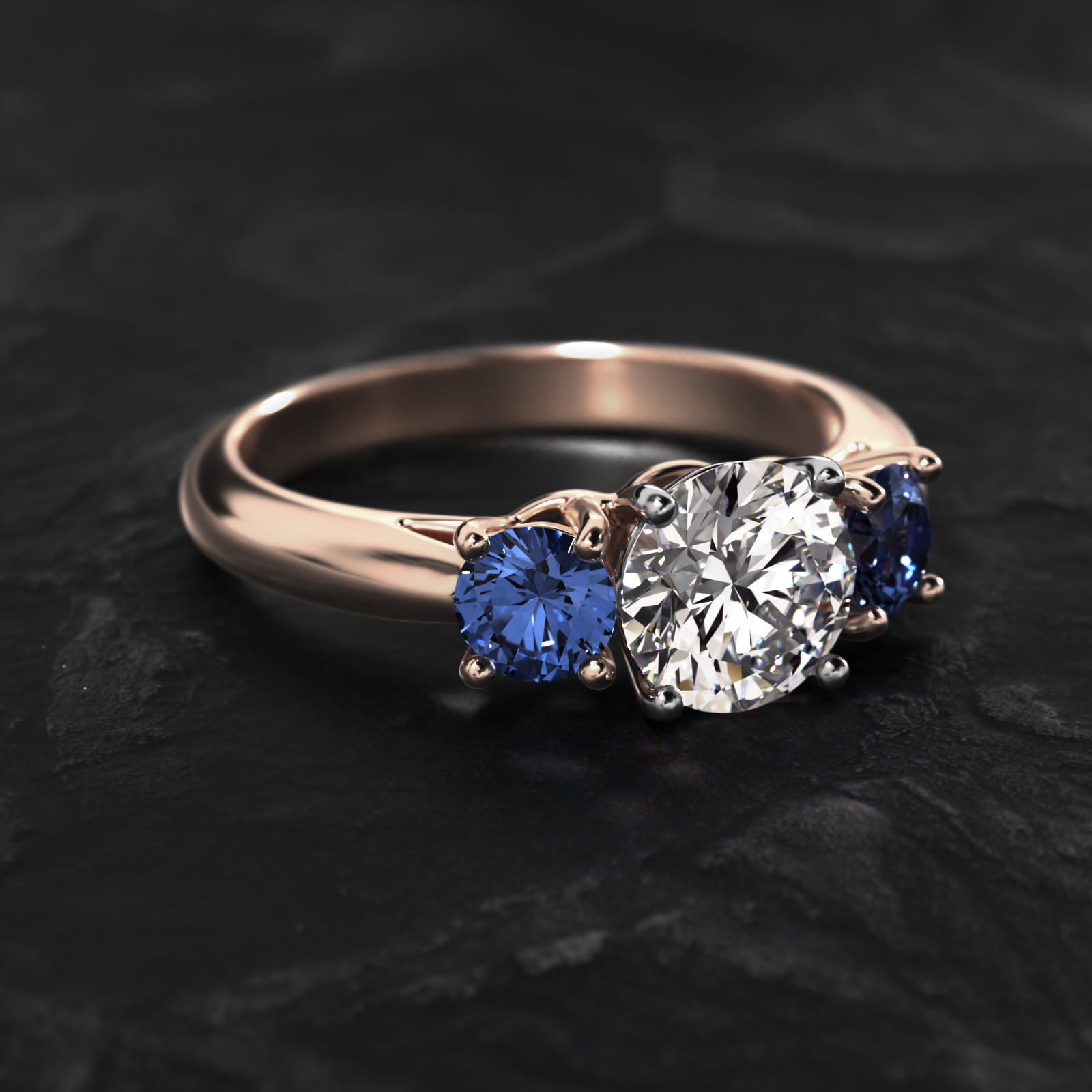 Round Blue Sapphire Three Stone Engagement Ring In 14K Rose Gold