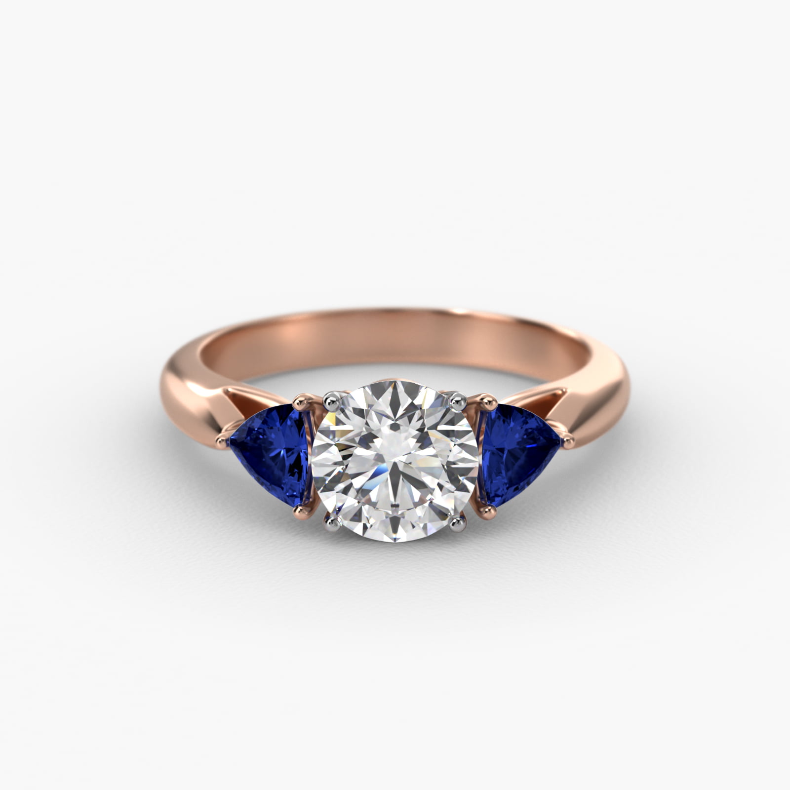 Trillion Cut Blue Sapphire Three Stone Engagement Ring In 14K Rose Gold