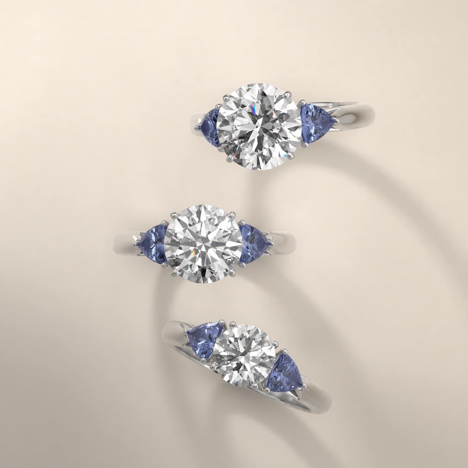 Trillion Cut Blue Sapphire Three Stone Engagement Ring In Platinum